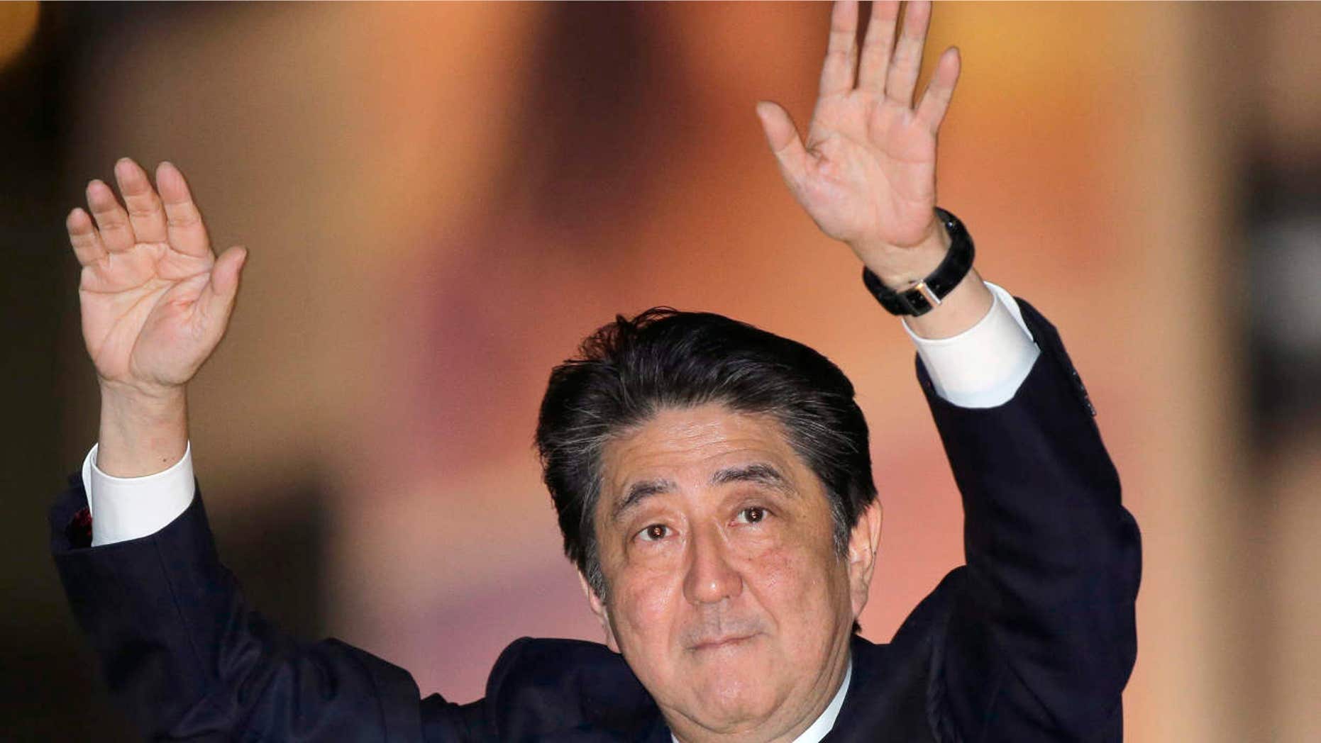 Oct. 18, 2017: Japan's Prime Minister and President of the ruling Liberal Democratic Party Shinzo Abe waves to the crowd in support for his party's candidate during an election campaign for the upcoming lower house election in Tokyo.