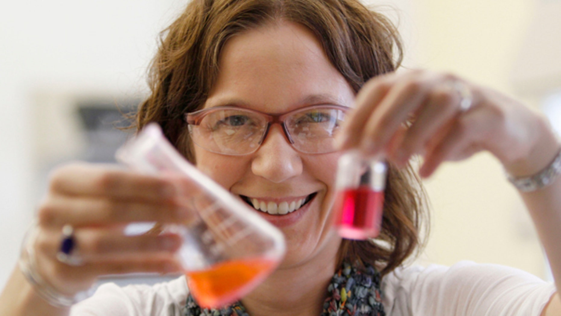 Sept. 15, 2011: William & Mary professor Elizabeth Harbron displays vials with merocyanine and rhodamine dye in her lab in Williamsburg, Va.