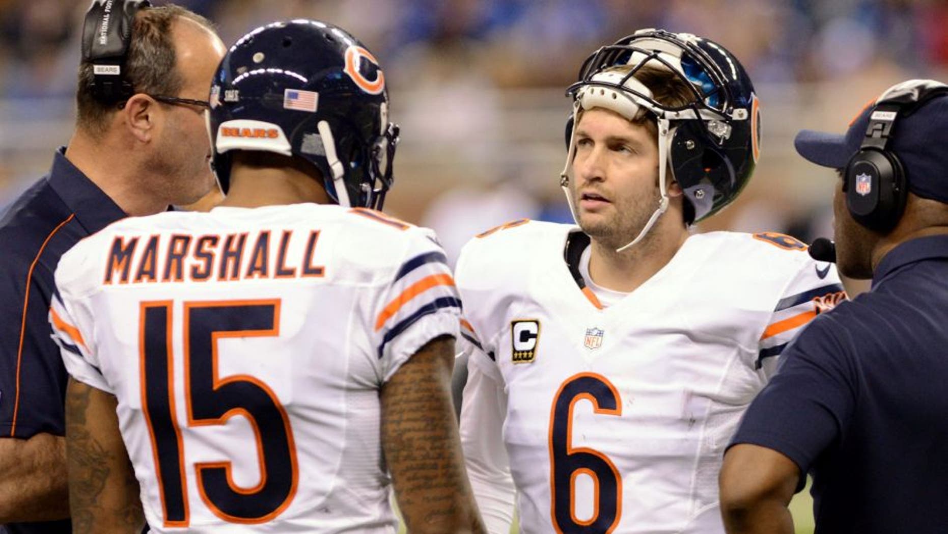 DETROIT, MI - DECEMBER 30: Brandon Marshall #15 and Jay Cutler #6 of the Chicago Bears talk with coaches on the sidelines during the game against the Detroit Lions at Ford Field on December 30, 2012 in Detroit, Michigan. The Bears defeated the Lions 26-24. (Photo by Mark Cunningham/Detroit Lions/Getty Images)