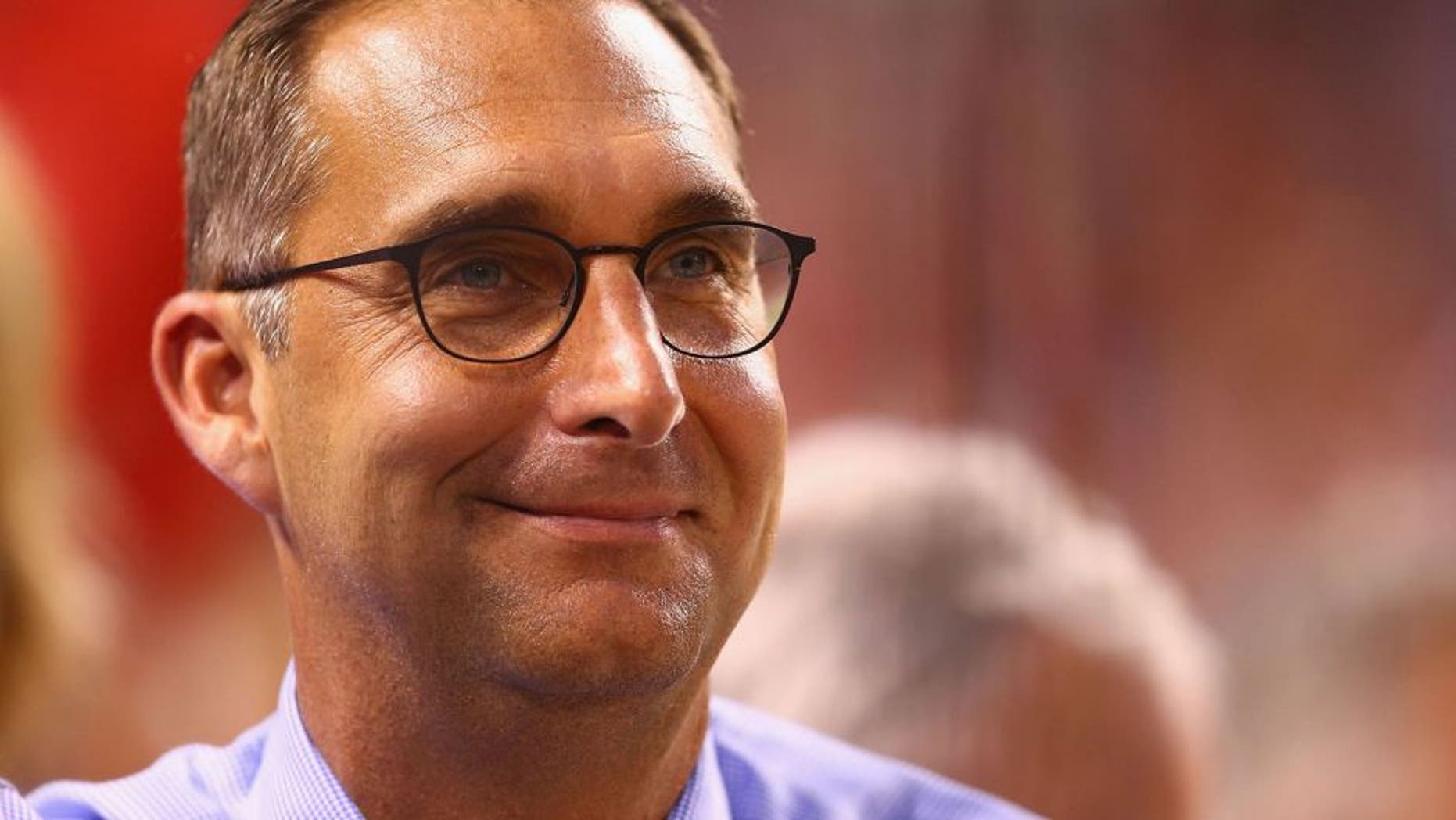 ST. LOUIS, MO - JULY 28: St. Louis Cardinals general manager John Mozeliak looks on from the stands during a game against the Cincinnati Reds at Busch Stadium on July 28, 2015 in St. Louis, Missouri. (Photo by Dilip Vishwanat/Getty Images)
