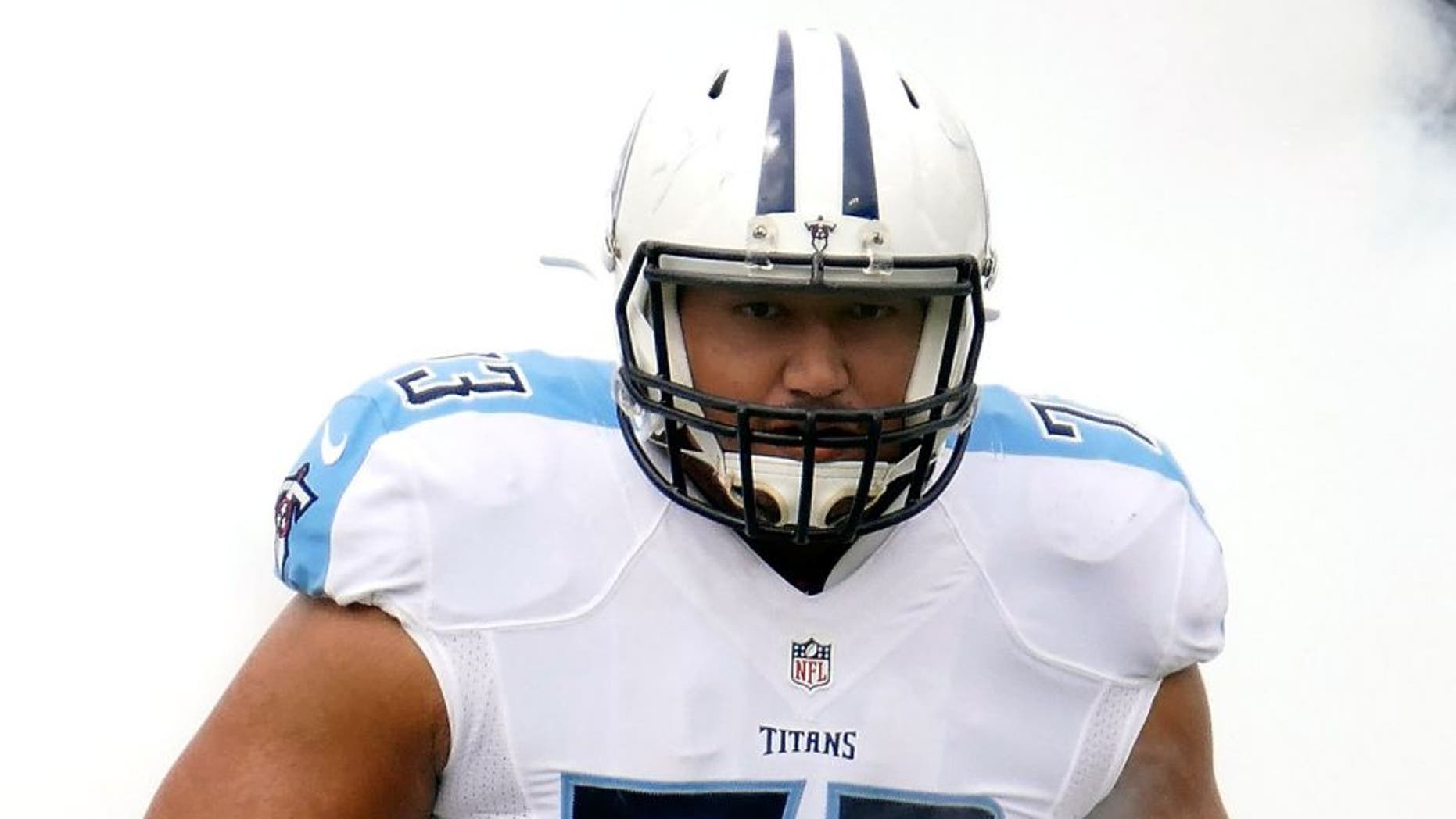 NASHVILLE, TN - SEPTEMBER 27: Jeremiah Poutasi #73 of the Tennessee Titans runs onto the field prior to a game against the Indianapolis Colts at Nissan Stadium on September 27, 2015 in Nashville, Tennessee. (Photo by Frederick Breedon/Getty Images)