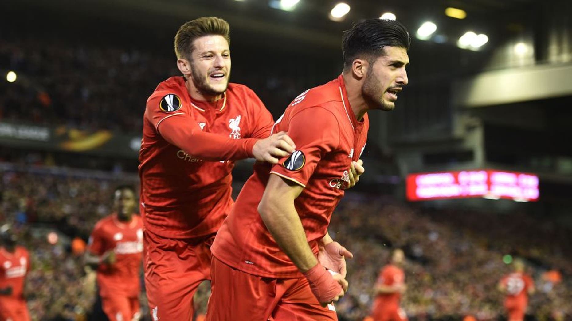 LIVERPOOL, ENGLAND - OCTOBER 22: Emre Can (R) of Liverpool is congratulated by teammate Adam Lallana of Liverpool after scoring a goal to level the scores at 1-1 during the UEFA Europa League Group B match between Liverpool FC and Rubin Kazan at Anfield on October 22, 2015 in Liverpool, United Kingdom. (Photo by Michael Regan/Getty Images)