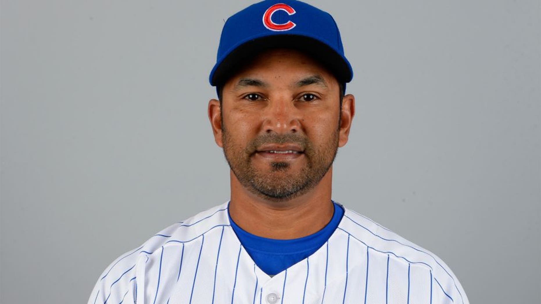 MESA, AZ - MARCH 2: Bench coach Dave Martinez #4 of the Chicago Cubs poses during Photo Day on Monday, March 2, 2015 at Sloan Park in Mesa, Arizona. (Photo by Ron Vesely/MLB Photos via Getty Images)