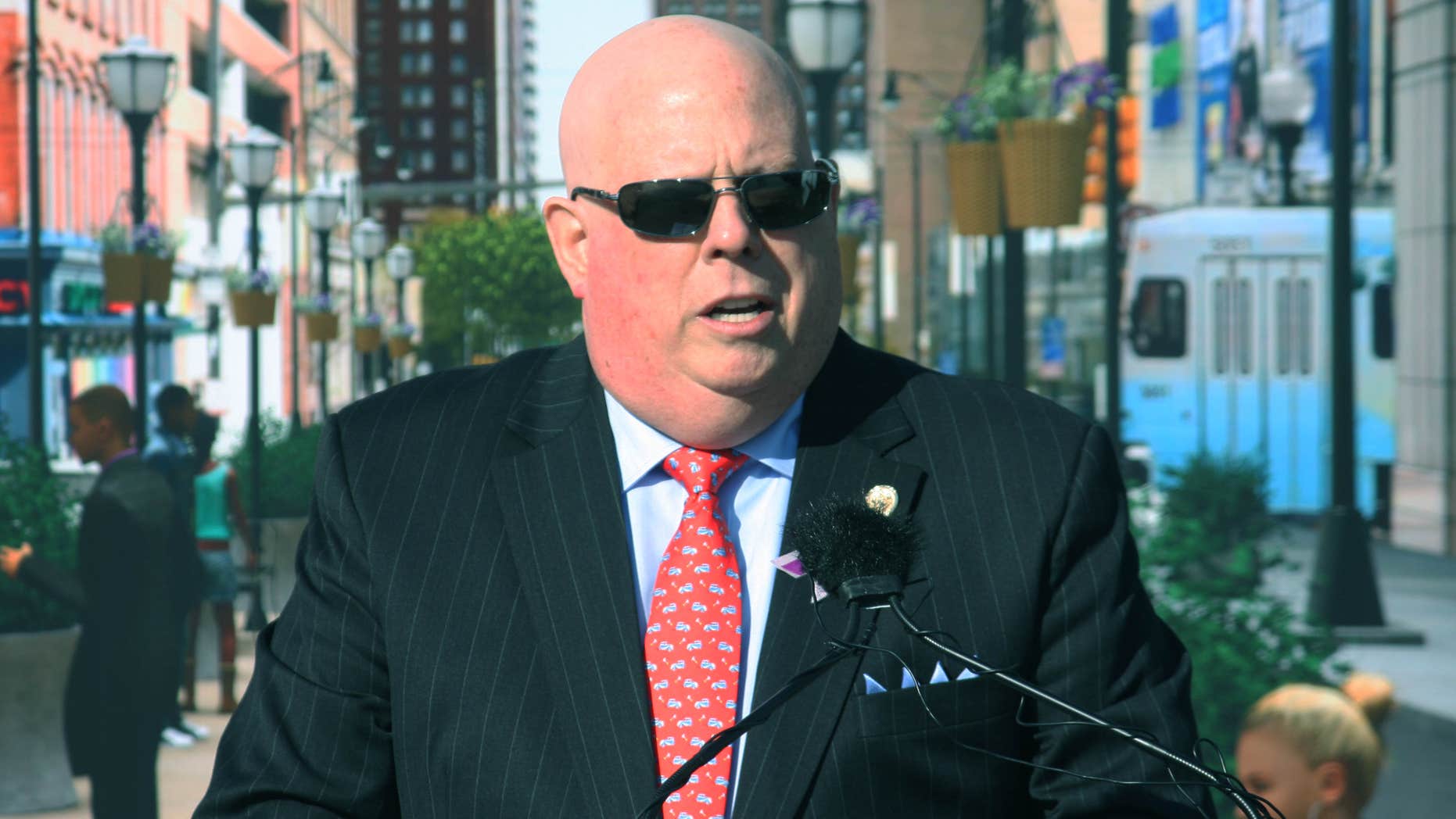Oct. 22, 2015: Maryland Gov. Larry Hogan announces a $135 million plan to redesign Baltimore’s transit system during a news conference at a commuter train station, where he spoke in front of a backdrop of a city scene.