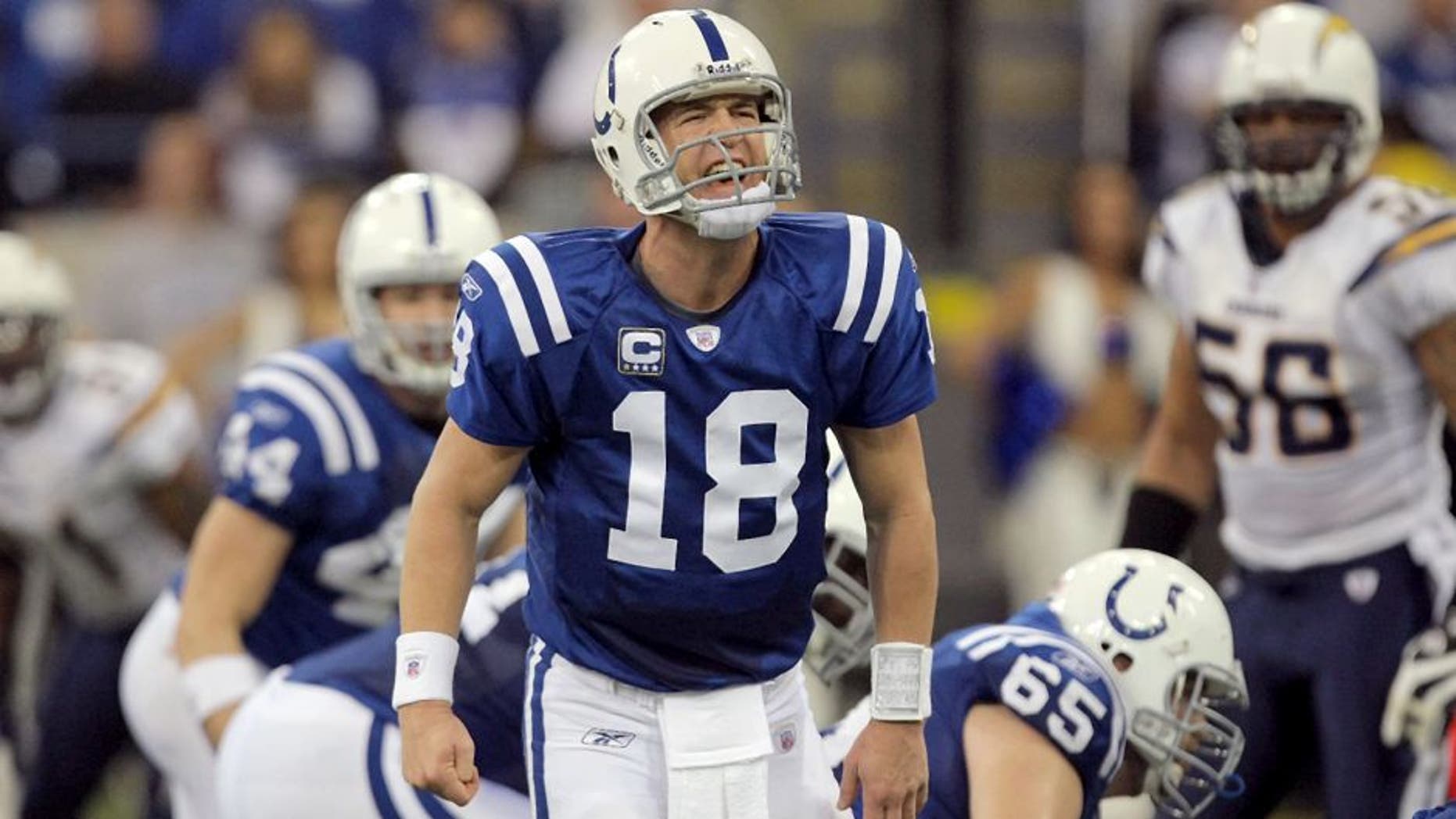 INDIANAPOLIS - JANUARY 13: Peyton Manning #18 of the Indianapolis Colts calls out signals at the line of scrimmage against the San Diego Chargers during their AFC Divisional Playoff game at the RCA Dome on January 13, 2008 in Indianapolis, Indiana. The Chargers won 28-24. (Photo by Streeter Lecka/Getty Images)