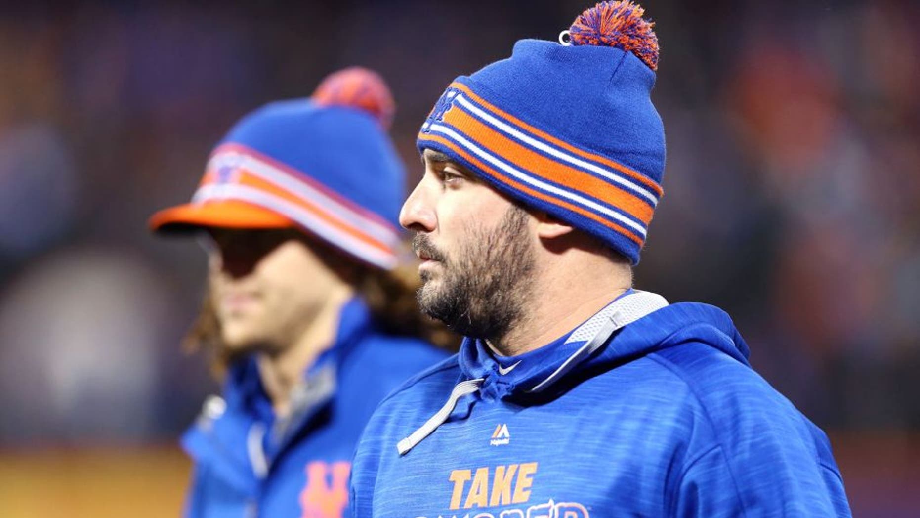 NEW YORK, NY - OCTOBER 18: Matt Harvey #33 and Jacob deGrom #48 of the New York Mets walk on the field prior to game two of the 2015 MLB National League Championship Series against the Chicago Cubs at Citi Field on October 18, 2015 in the Flushing neighborhood of the Queens borough of New York City. (Photo by Elsa/Getty Images)