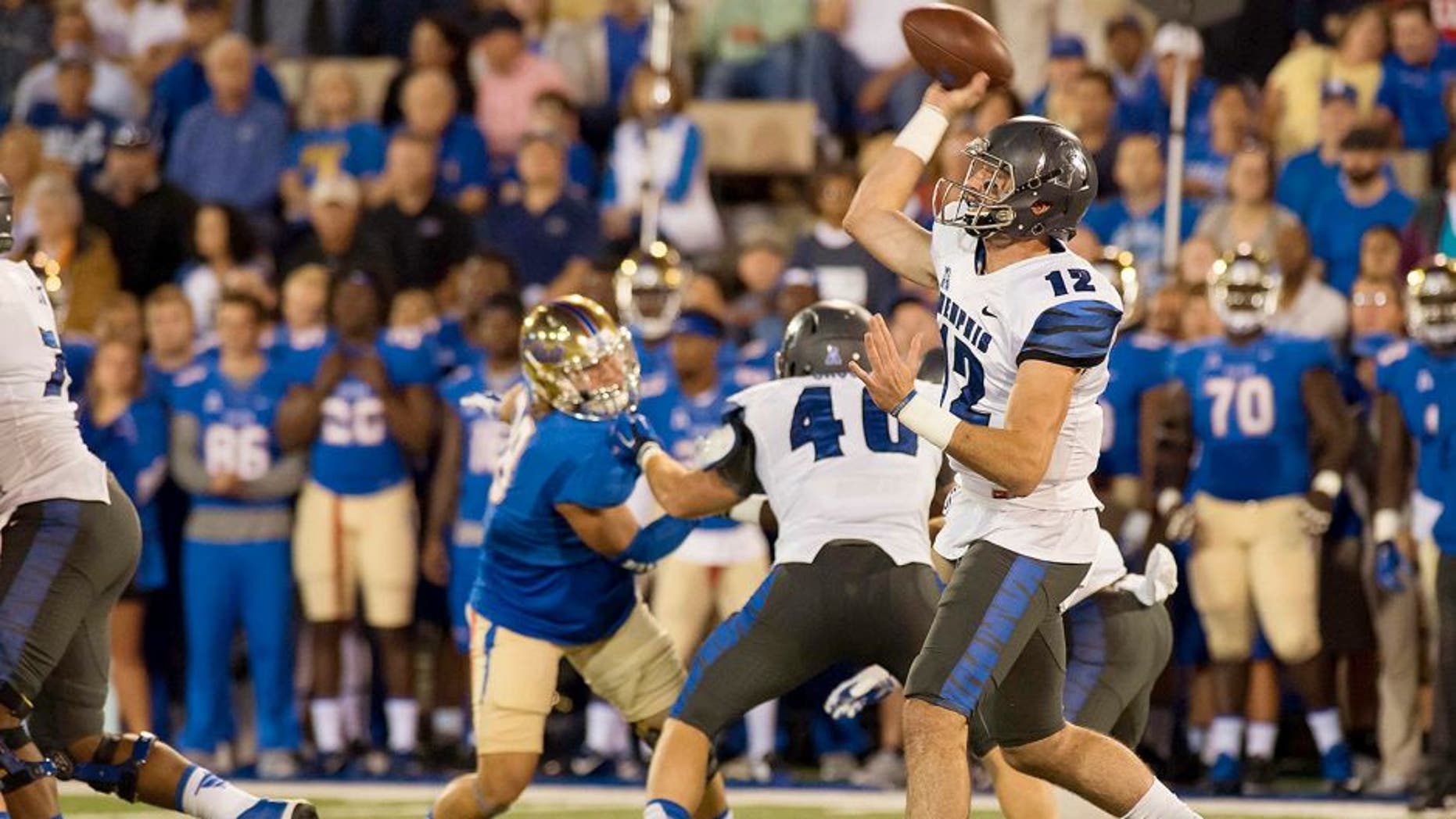 Oct 23, 2015; Tulsa, OK, USA; Memphis Tigers quarterback Paxton Lynch (12) throws the ball against the Tulsa Golden Hurricane during the first quarter at Skelly Field at H.A. Chapman Stadium. Mandatory Credit: Rob Ferguson-USA TODAY Sports