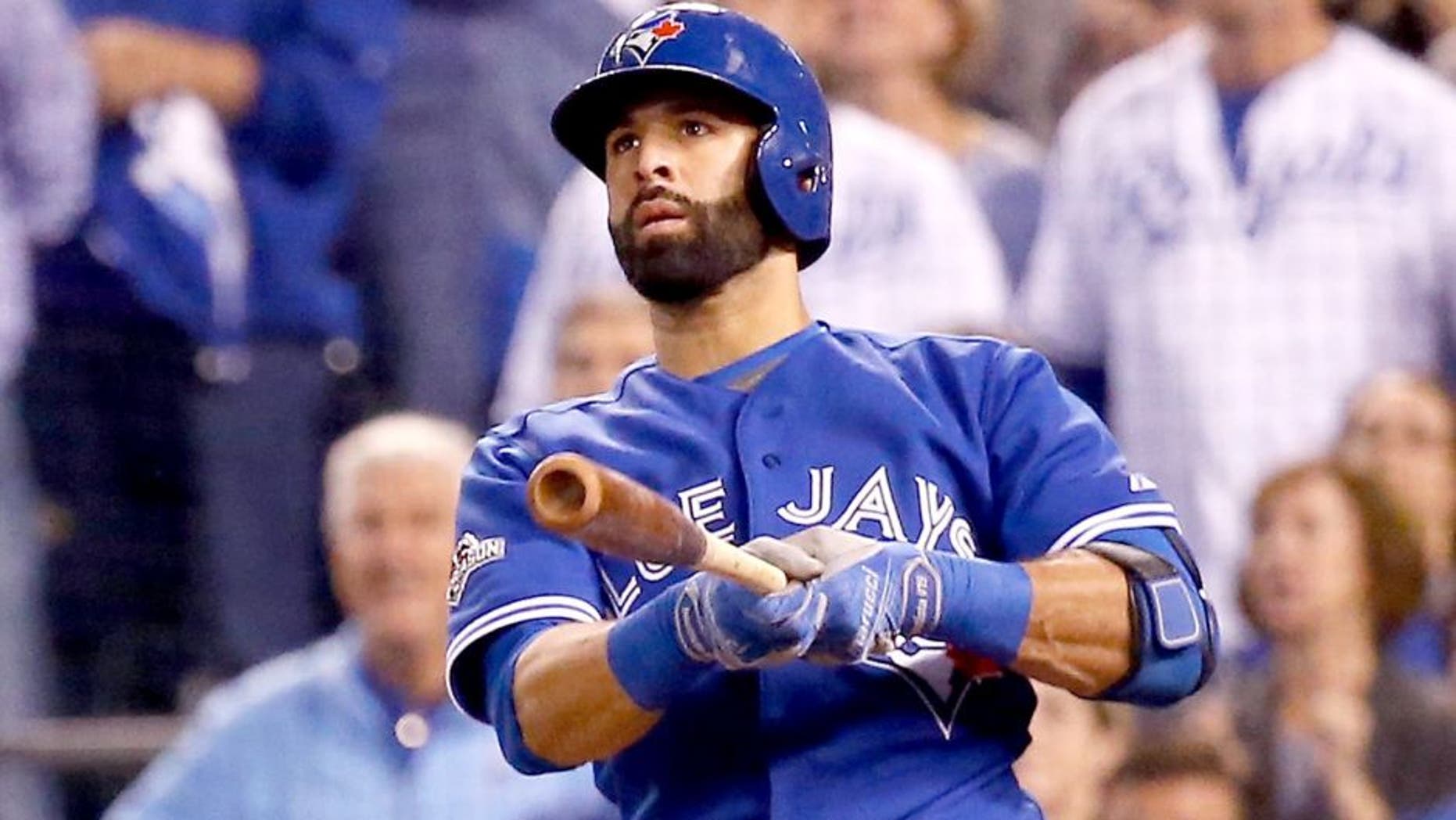 KANSAS CITY, MO - OCTOBER 23: Jose Bautista #19 of the Toronto Blue Jays hits a two-run home run in the eighth inning against the Kansas City Royals in game six of the 2015 MLB American League Championship Series at Kauffman Stadium on October 23, 2015 in Kansas City, Missouri. (Photo by Rob Carr/Getty Images)