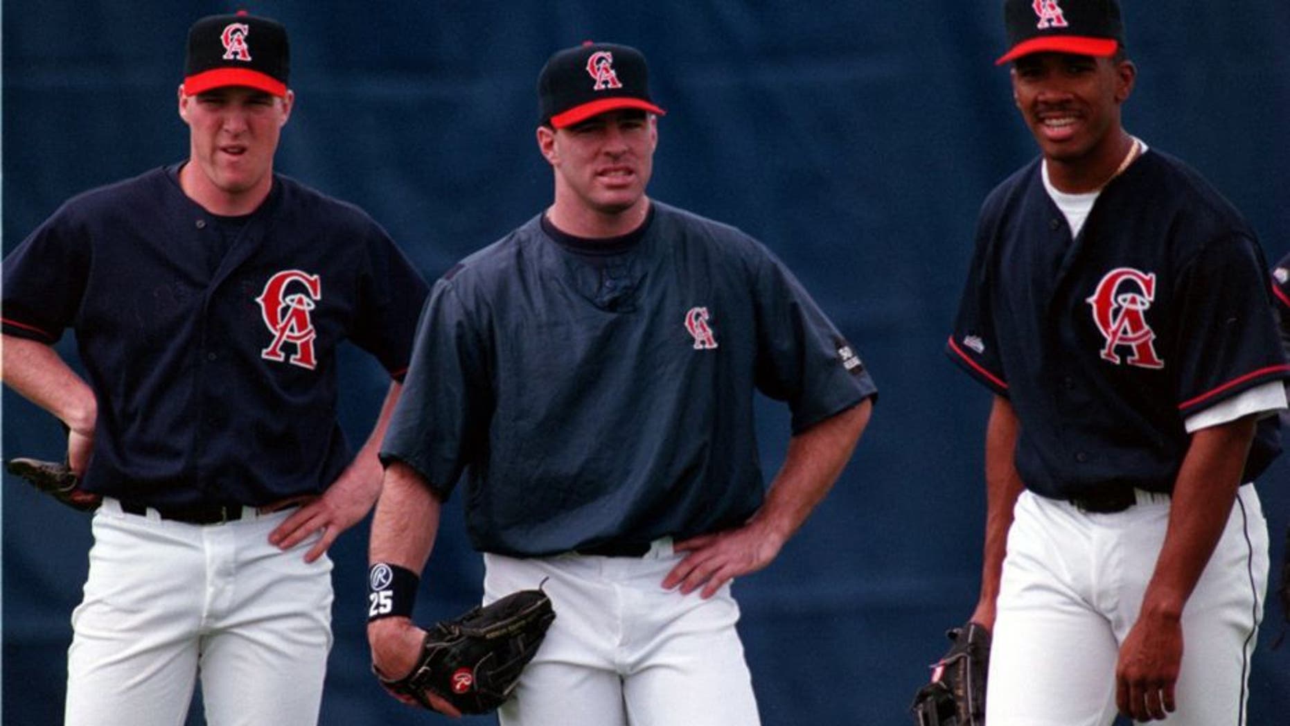 SP.Angel.Outfield.grp.0223.AAGññAngels outfielders during spring training practice (lñR) Darin Erstad, Jim Edmonds, and Garret Anderson. (Photo by Alex Garcia/Los Angeles Times via Getty Images)