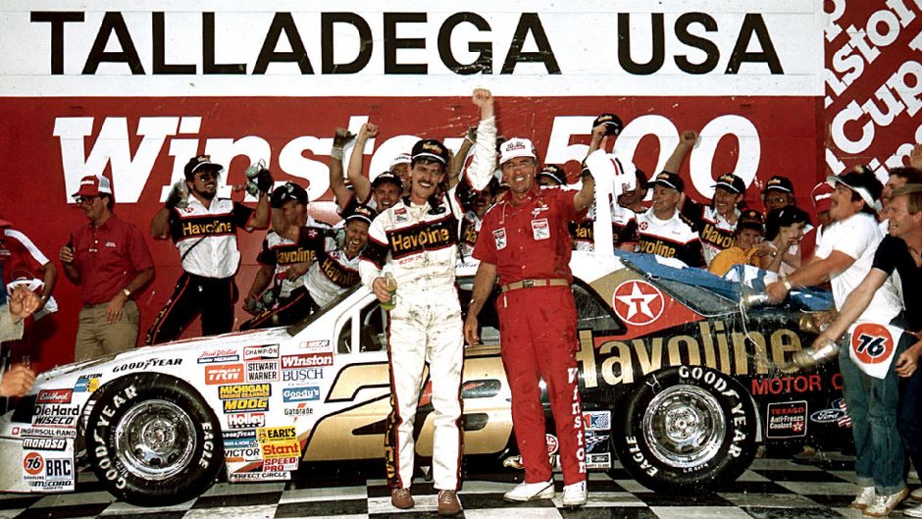 TALLADEGA, AL - MAY 3, 1987: Davey Allison and his crew celebrate in victory lane following their win in the Winston 500 at Alabama International Motor Speedway. It was Allisonâs first career NASCAR Cup victory. (Photo by ISC Images & Archives via Getty Images)