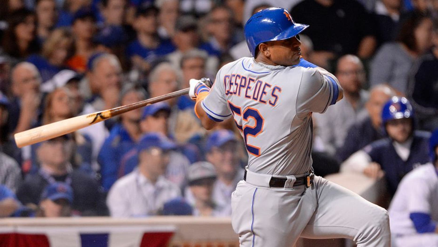 CHICAGO, IL - OCTOBER 20: Yoenis Cespedes #52 of the New York Mets singles in the top of the sixth inning of Game 3 of the NLCS against the Chicago Cubs at Wrigley Field on Tuesday, October 20, 2015 in Chicago , Illinois. (Photo by Ron Vesely/MLB Photos via Getty Images)