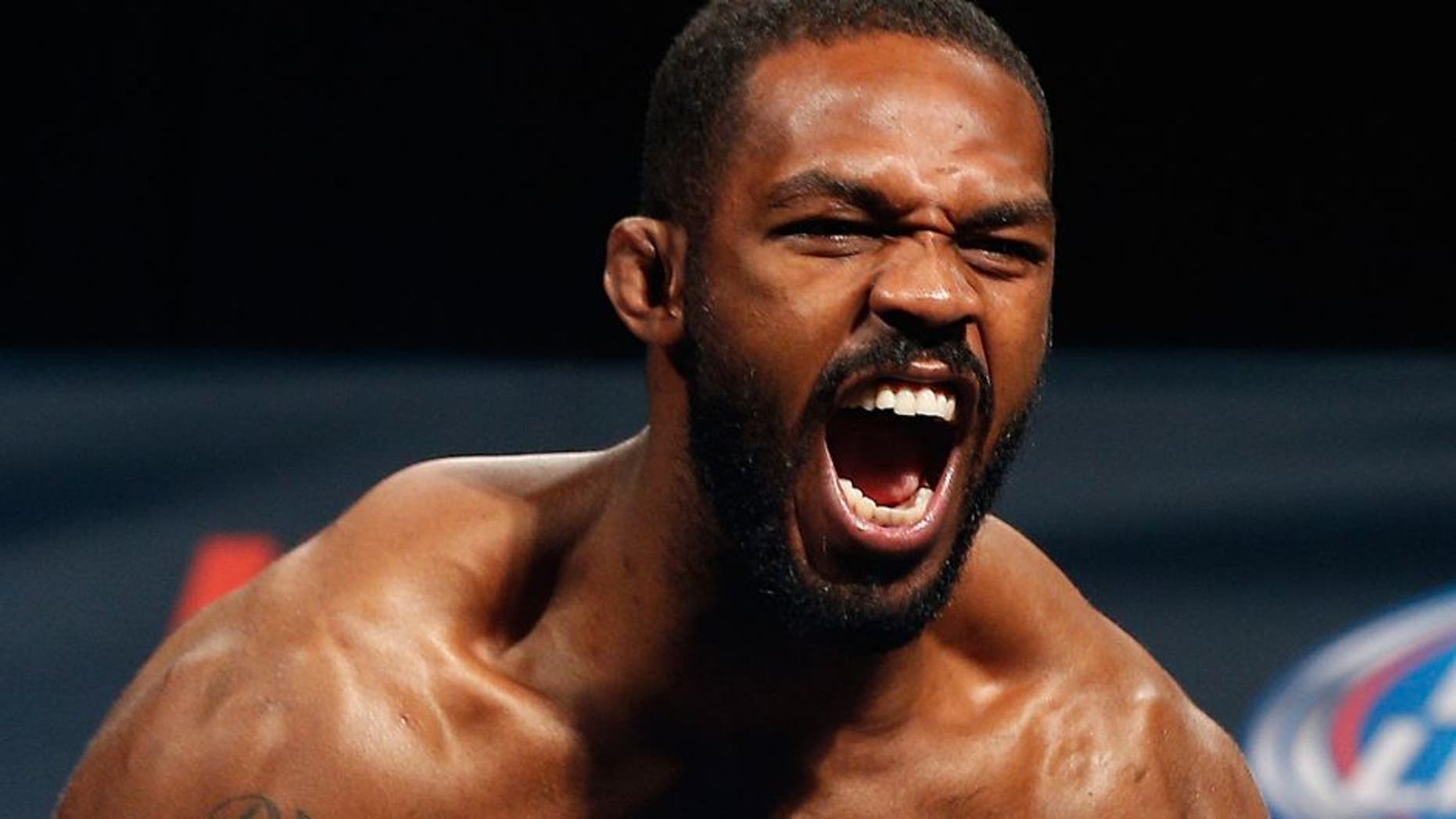 LAS VEGAS, NV - JANUARY 02: UFC light heavyweight champion Jon "Bones" Jones poses on the scale after weighing in during the UFC 182 weigh-in event at the MGM Grand Conference Center on January 2, 2015 in Las Vegas, Nevada. (Photo by Josh Hedges/Zuffa LLC/Zuffa LLC via Getty Images)