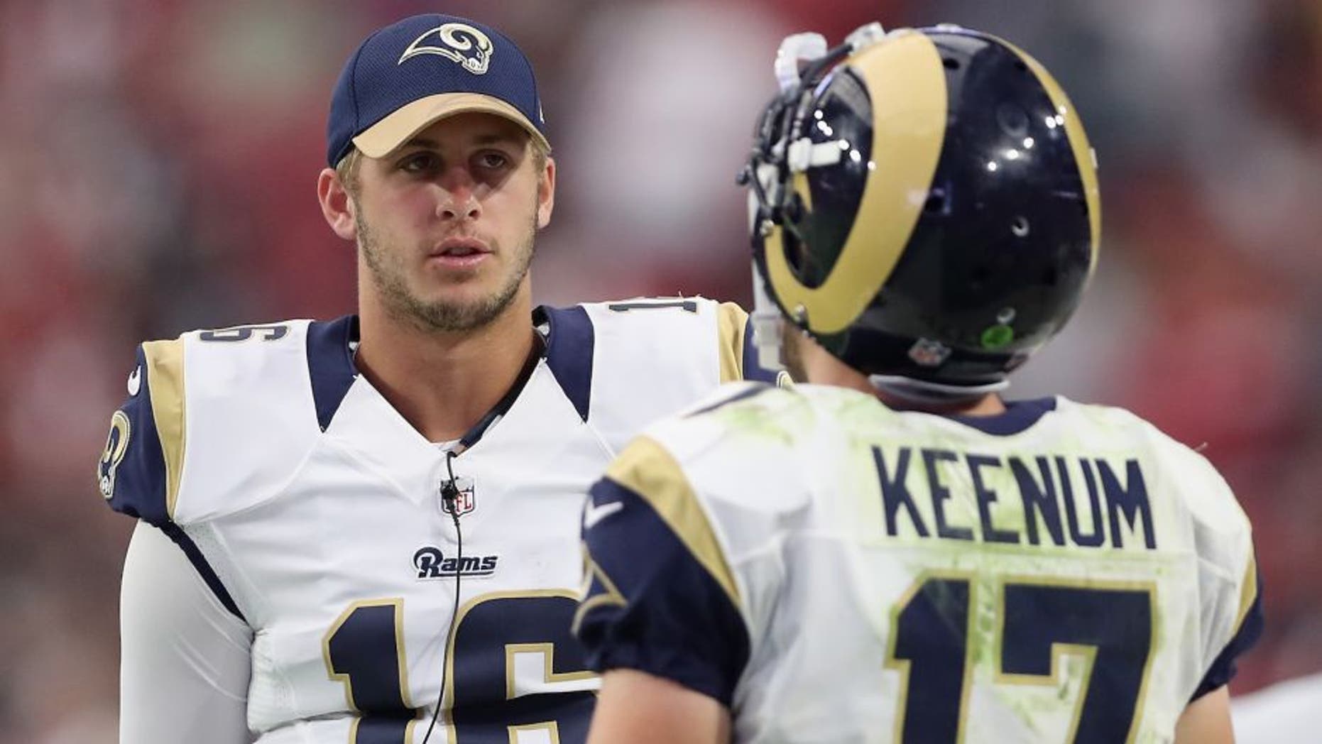 GLENDALE, AZ - OCTOBER 02: Quarterback Jared Goff #16 of the Los Angeles Rams talks with Case Keenum #17 on the sidelines during the NFL game against the Arizona Cardinals at the University of Phoenix Stadium on October 2, 2016 in Glendale, Arizona. The Rams defeated the Cardinals 17-13. (Photo by Christian Petersen/Getty Images)