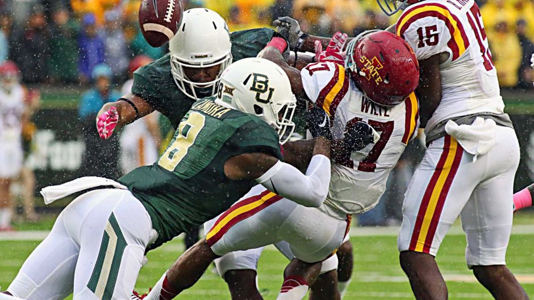 Oct 24, 2015; Waco, TX, USA; Baylor Bears Ishmael Zamora (8) forces the fumble on the kick return by Iowa State Cyclones defensive back Jomal Wiltz (17) on during the first quarter at McLane Stadium. Mandatory Credit: Ray Carlin-USA TODAY Sports