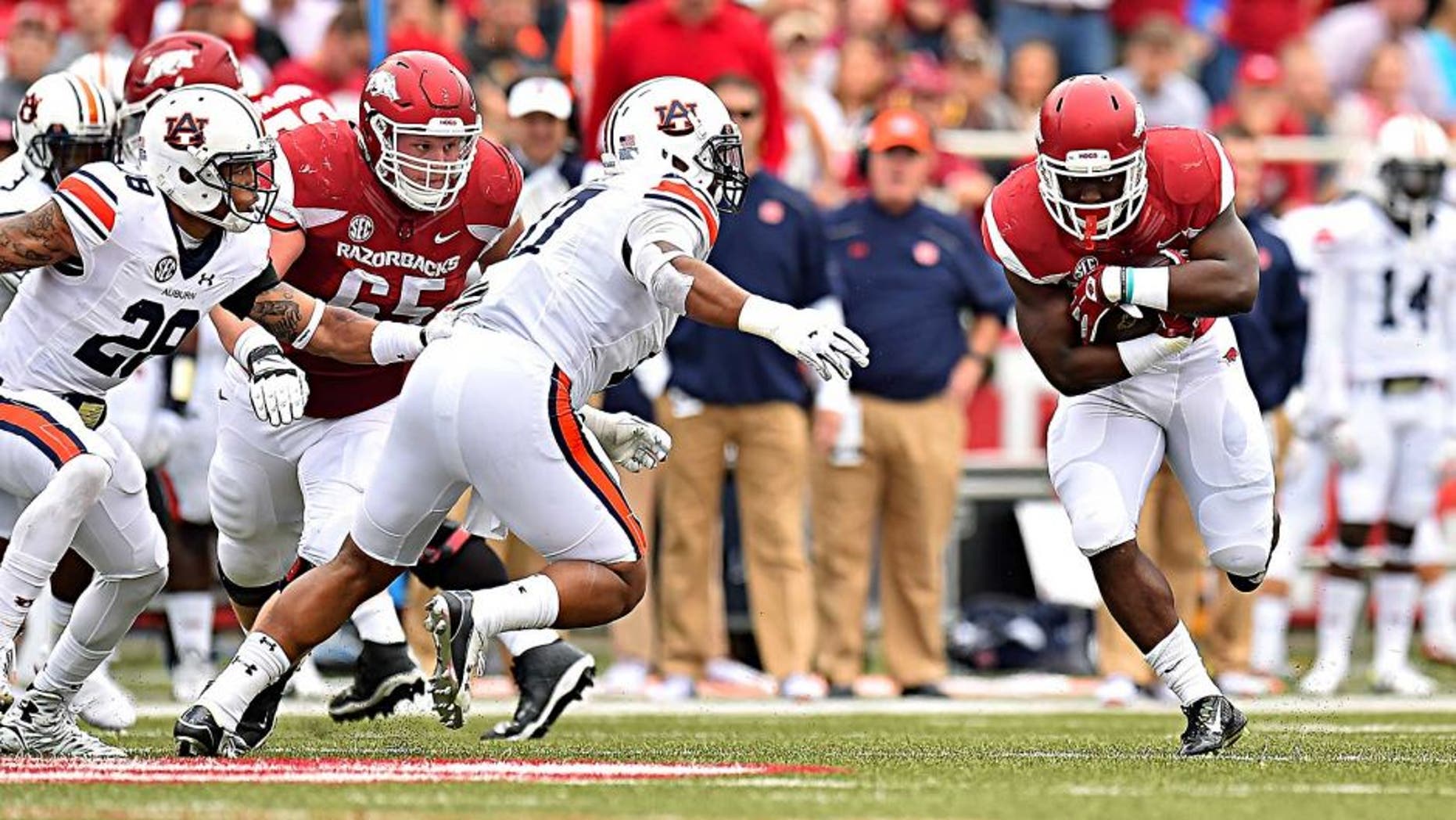 Oct 24, 2015; Fayetteville, AR, USA; Arkansas Razorbacks running back Rawleigh Williams (22) runs the ball against the Auburn Tigers during the first half at Donald W. Reynolds Razorback Stadium. Mandatory Credit: Jasen Vinlove-USA TODAY Sports