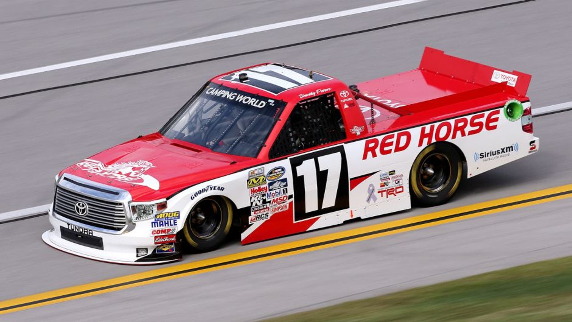 TALLADEGA, AL - OCTOBER 24: Timothy Peters, driver of the #17 Red Horse Racing Toyota, qualifies for the NASCAR Camping World Truck Series fred's 250 at Talladega Superspeedway on October 24, 2015 in Talladega, Alabama. (Photo by Todd Warshaw/Getty Images)