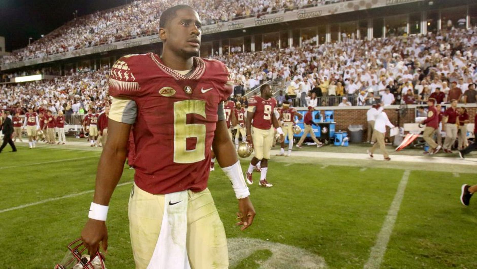 Oct 24, 2015; Atlanta, GA, USA; Florida State Seminoles quarterback Everett Golson (6) walks off of the field after Florida State lost to the Georgia Tech Yellow Jackets at Bobby Dodd Stadium. Georgia Tech won 22-16. Mandatory Credit: Jason Getz-USA TODAY Sports