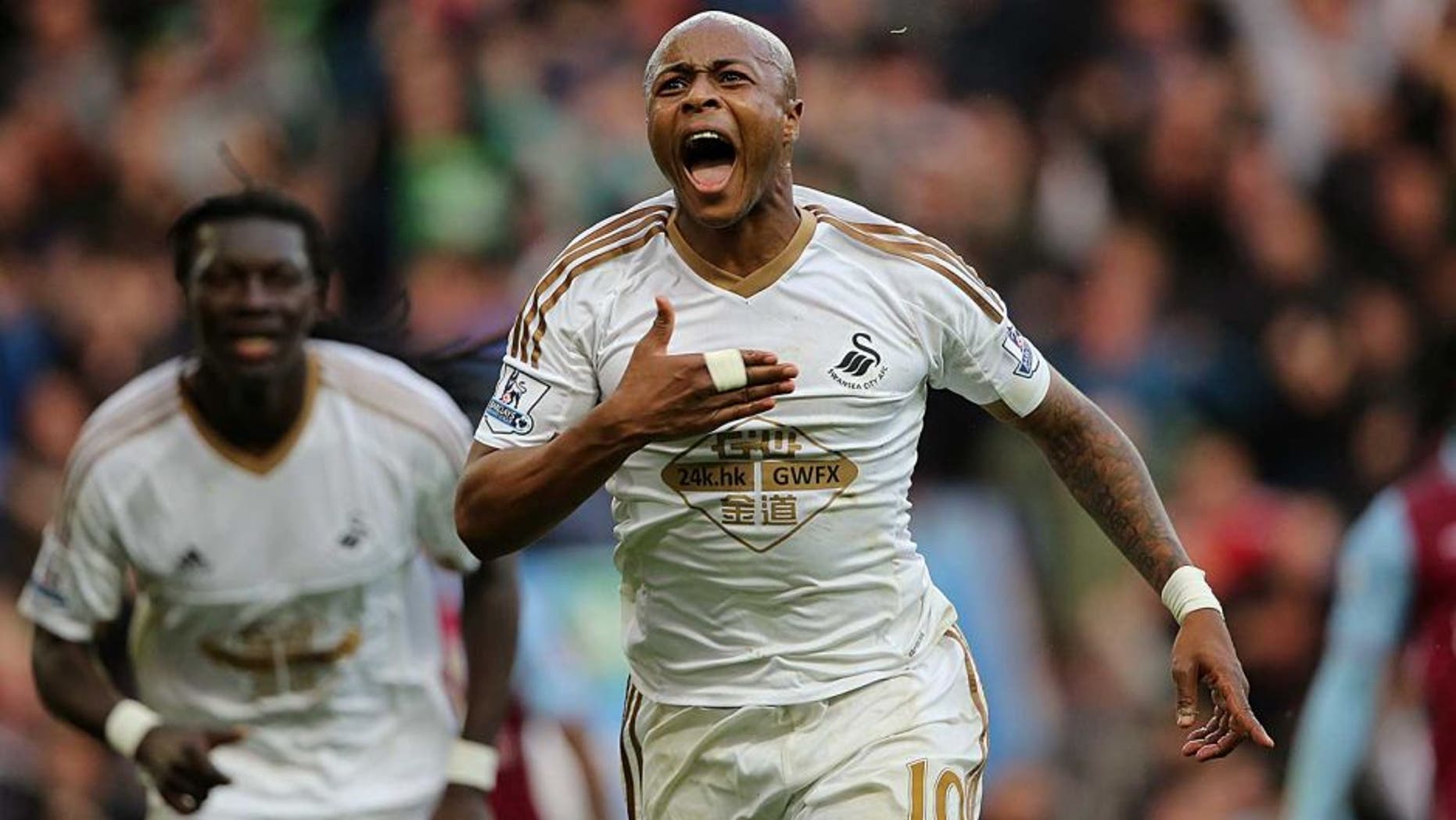 BRIMINGHAM, ENGLAND - OCTOBER 24: Andre Ayew of Swansea City celebrates after scoring a goal to make it 1-2 during the Barclays Premier League match between Aston Villa and Swansea City at Villa Park on October 24, 2015 in Birmingham, England. (Photo by Matthew Ashton - AMA/Getty Images)