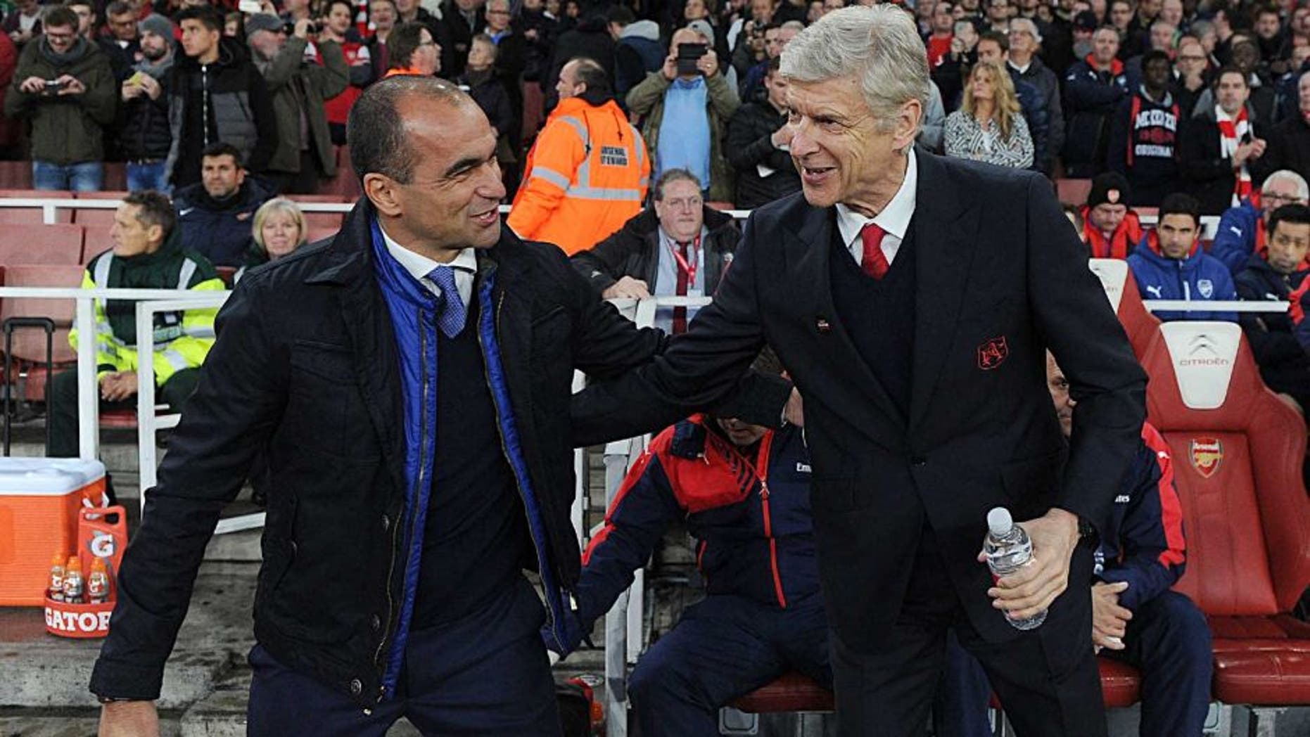 LONDON, ENGLAND - OCTOBER 24: Arsene Wenger the Arsenal Manager with Roberto Martinez the Everton Manager before the Barclays Premier League match between Arsenal and Everton at Emirates Stadium on October 24, 2015 in London, England. (Photo by David Price/Arsenal FC via Getty Images)
