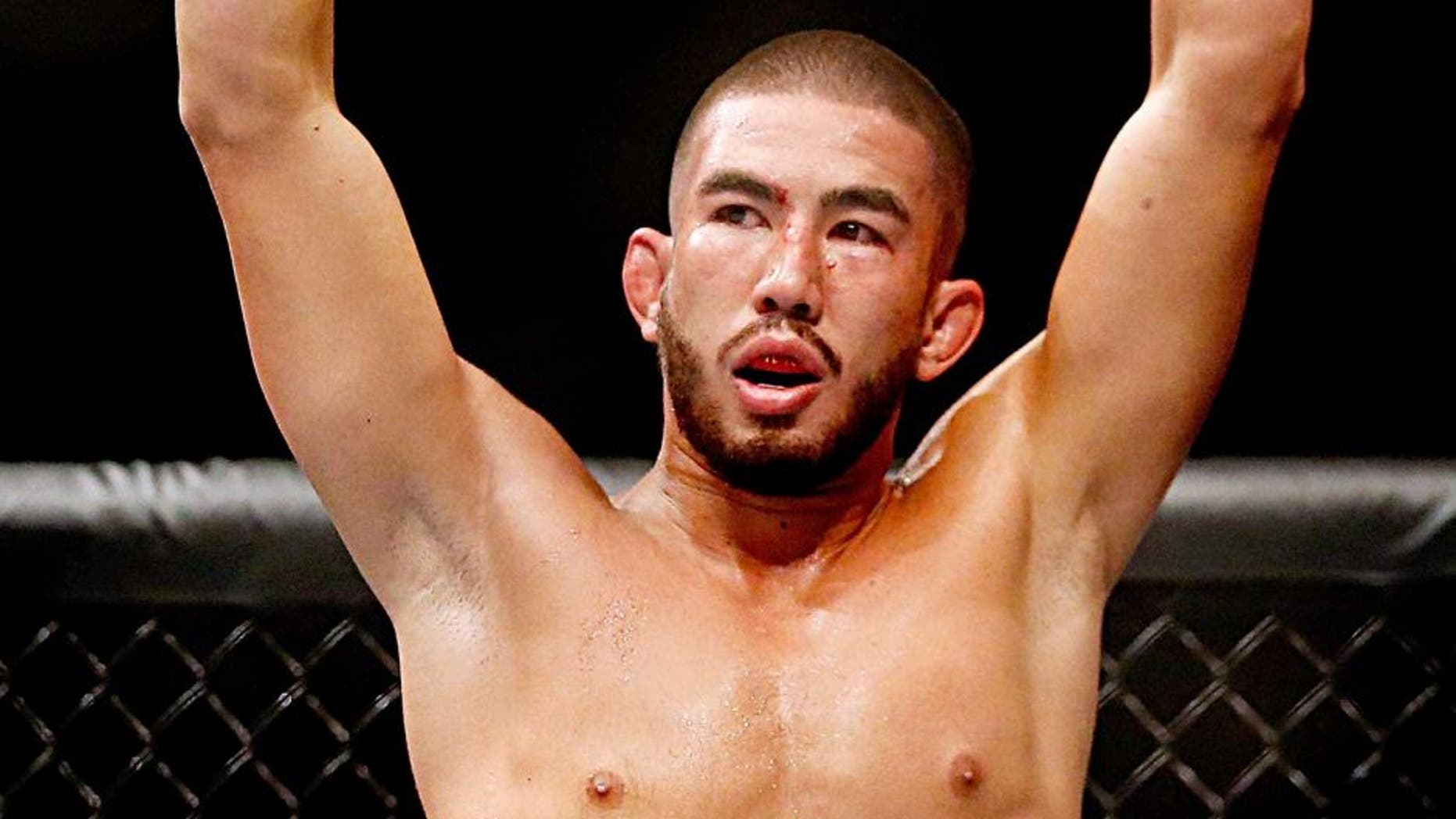 LAS VEGAS, NV - JULY 11: Louis Smolka reacts to his victory over Neil Seery in their flyweight fight during the UFC 189 event inside MGM Grand Garden Arena on July 11, 2015 in Las Vegas, Nevada. (Photo by Christian Petersen/Zuffa LLC/Zuffa LLC via Getty Images)