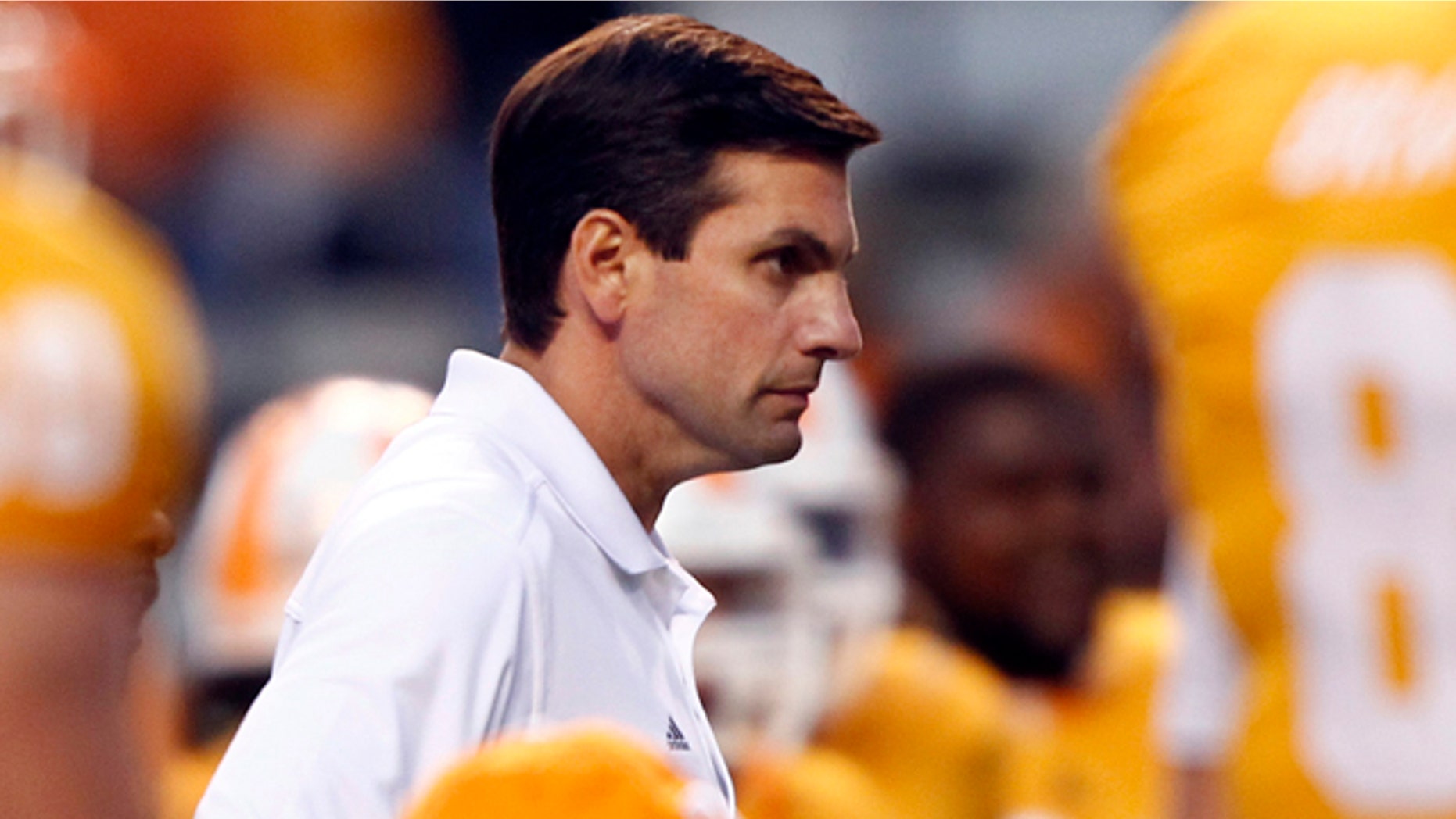 Oct. 23: Tennessee coach Derek Dooley looks on as his team warms up before an NCAA college football game against Alabama at Neyland Stadium in Knoxville, Tenn.