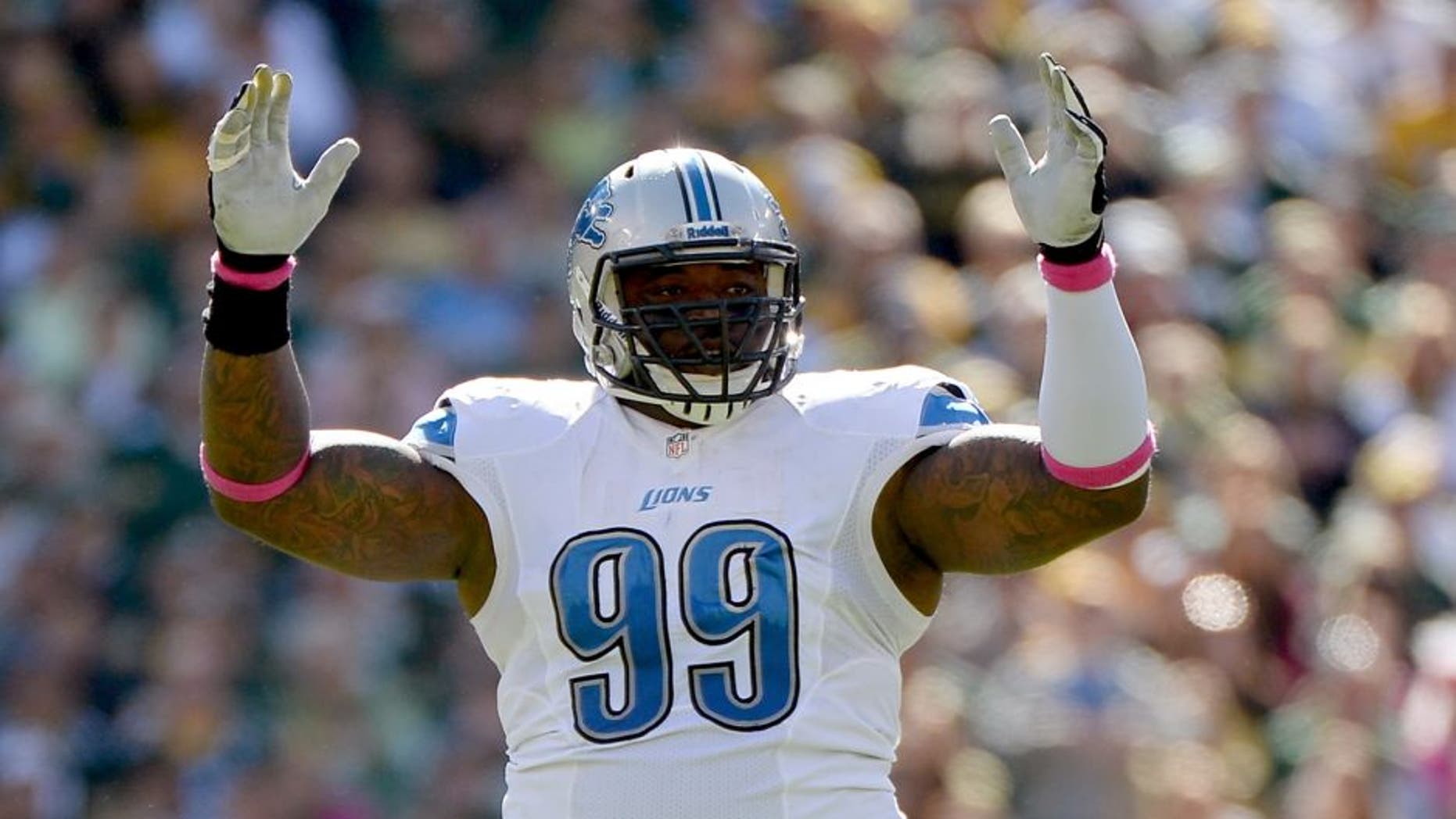 GREEN BAY, WI - OCTOBER 06: C.J. Mosley #99 of the Detroit Lions reacts after a Lions field goal to trail 6-3 to the Green Bay Packers during the second quarter at Lambeau Field on October 6, 2013 in Green Bay, Wisconsin. (Photo by Harry How/Getty Images)