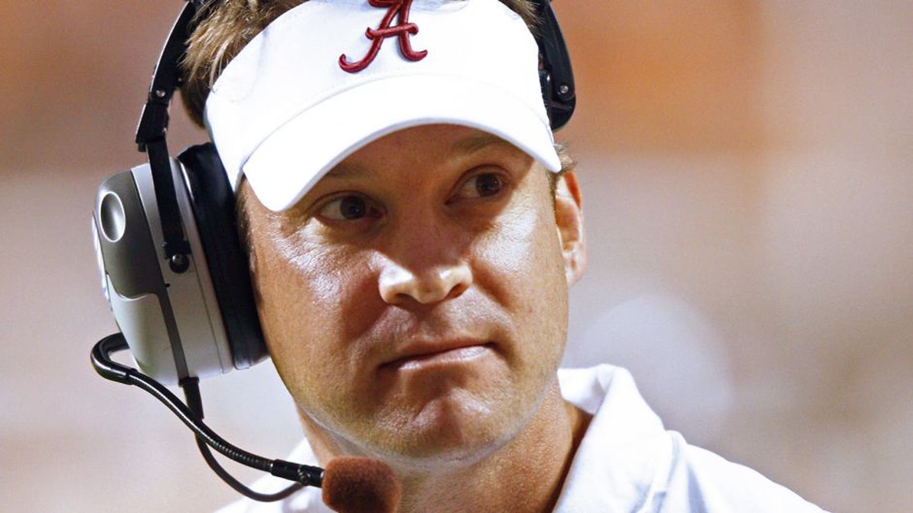Alabama offensive coordinator Lane Kiffin walks the sideline in the first quarter of an NCAA college football game against Tennessee on Saturday, Oct. 25, 2014 in Knoxville, Tenn. (AP Photo/Wade Payne)