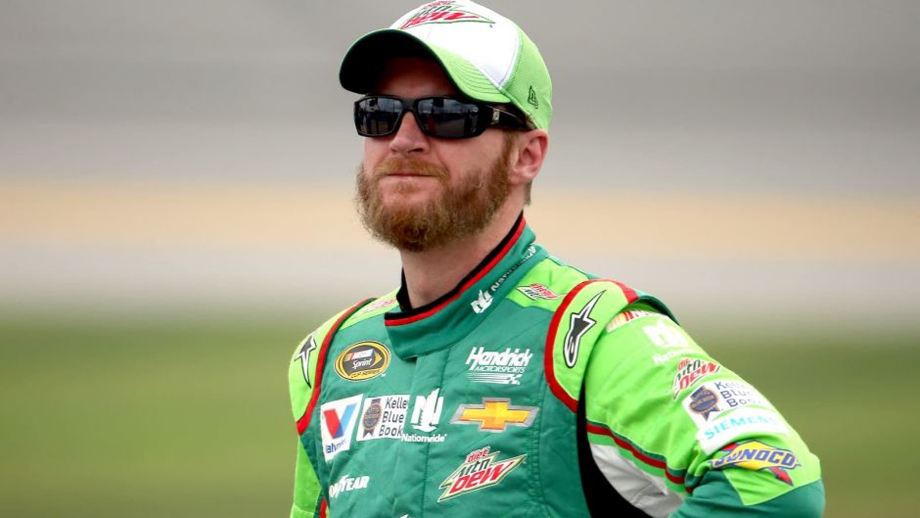 TALLADEGA, AL - OCTOBER 24: Dale Earnhardt Jr., driver of the #88 Diet Mountain Dew Chevrolet, stands on the grid during qualifying for the NASCAR Sprint Cup Series CampingWorld.com 500 at Talladega Superspeedway on October 24, 2015 in Talladega, Alabama. (Photo by Chris Graythen/NASCAR via Getty Images)