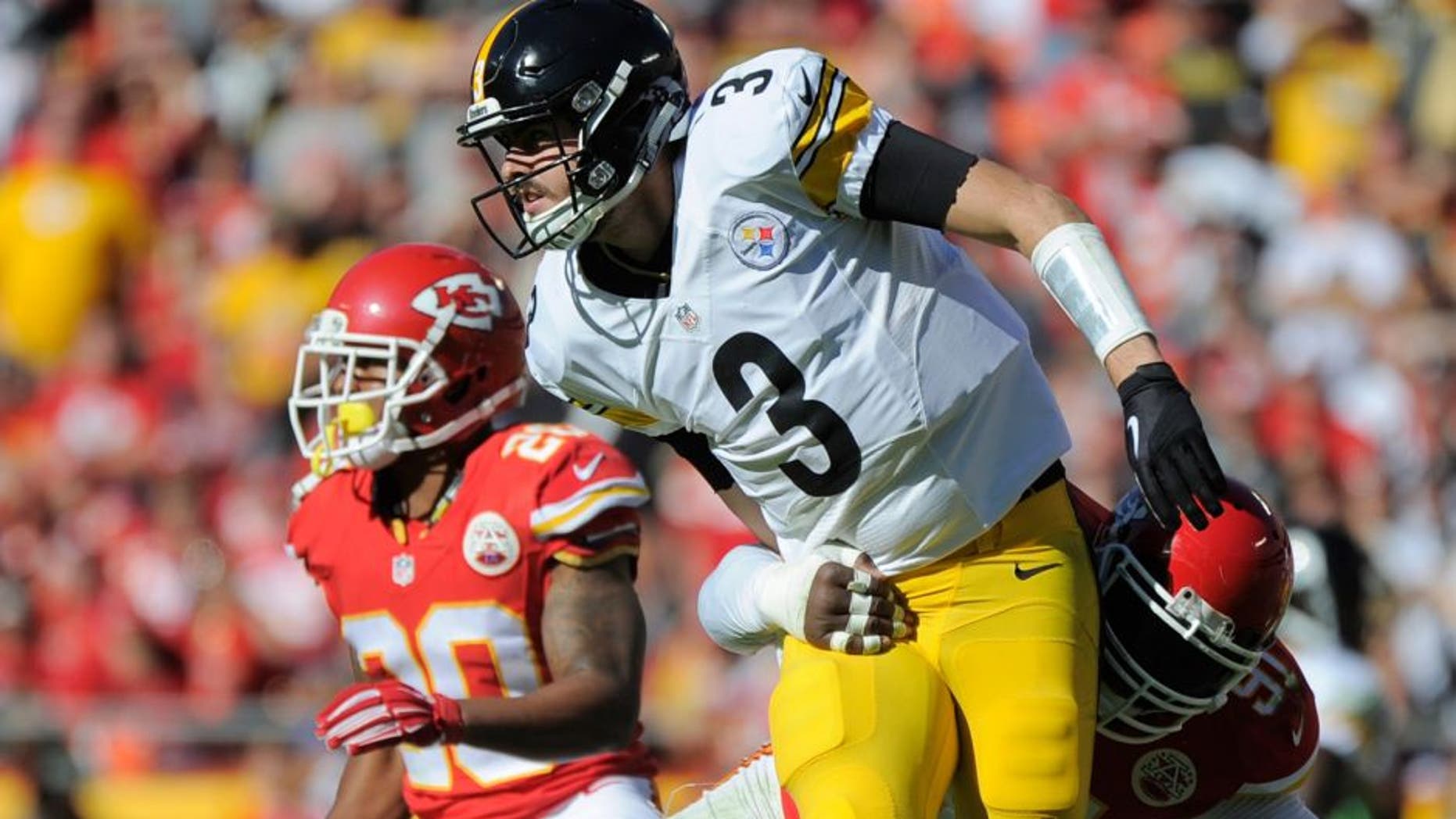Kansas City Chiefs linebacker Tamba Hali (91) sacks Pittsburgh Steelers quarterback Landry Jones (3) for a turnover during the second half of an NFL football game in Kansas City, Mo., Sunday, Oct. 25, 2015. The Chiefs won 23-13. (AP Photo/Ed Zurga)