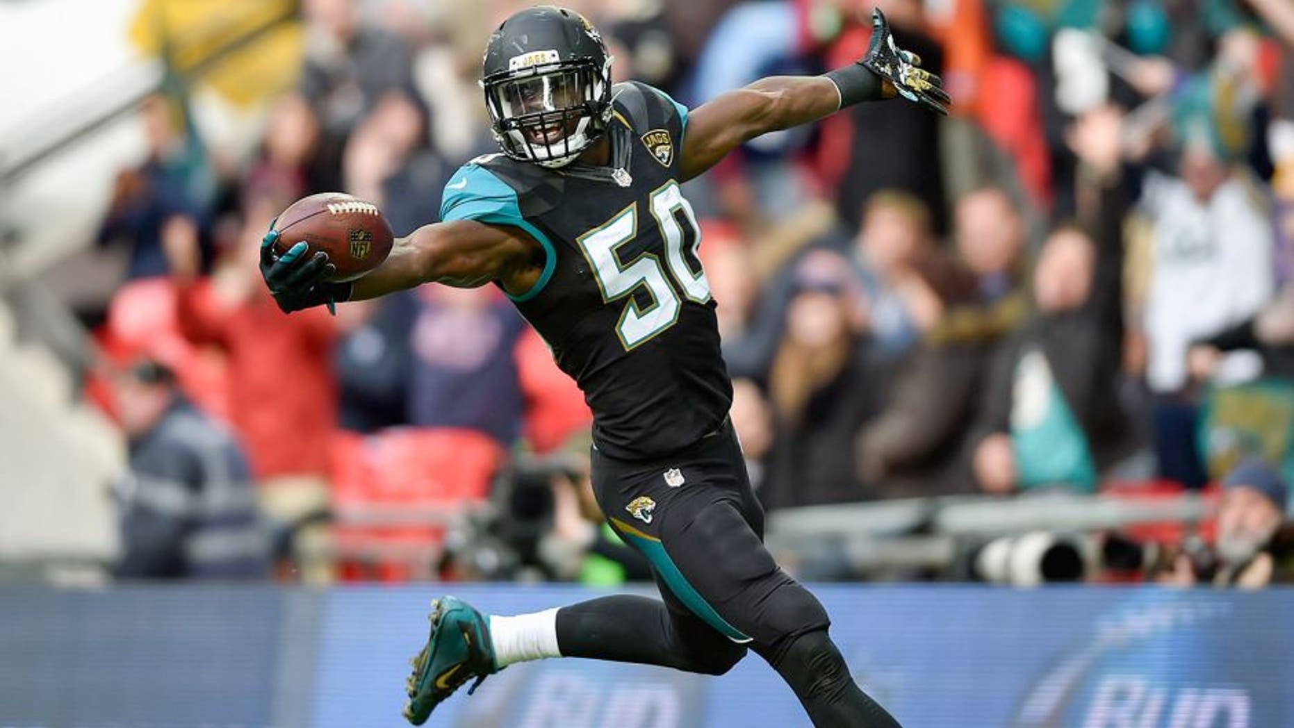 Oct 25, 2015; London, United Kingdom; Jacksonville Jaguars outside linebacker Telvin Smith (50) reacts after scoring a touchdown during the first half of the game against the Buffalo Bills at Wembley Stadium. Mandatory Credit: Steve Flynn-USA TODAY Sports