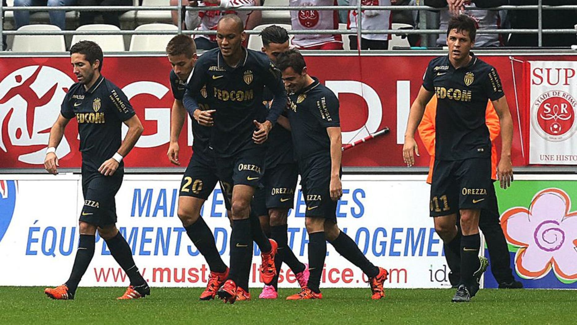 Monaco's Portuguese midfielder Silva Bernardo (2nd R) celebrates with teammates after scoring a goal during the French Ligue 1 football match between Reims and Monaco on October 25, 2015 at the Auguste Delaune Stadium in Reims. AFP PHOTO / FRANCOIS NASCIMBENI (Photo credit should read FRANCOIS NASCIMBENI/AFP/Getty Images)