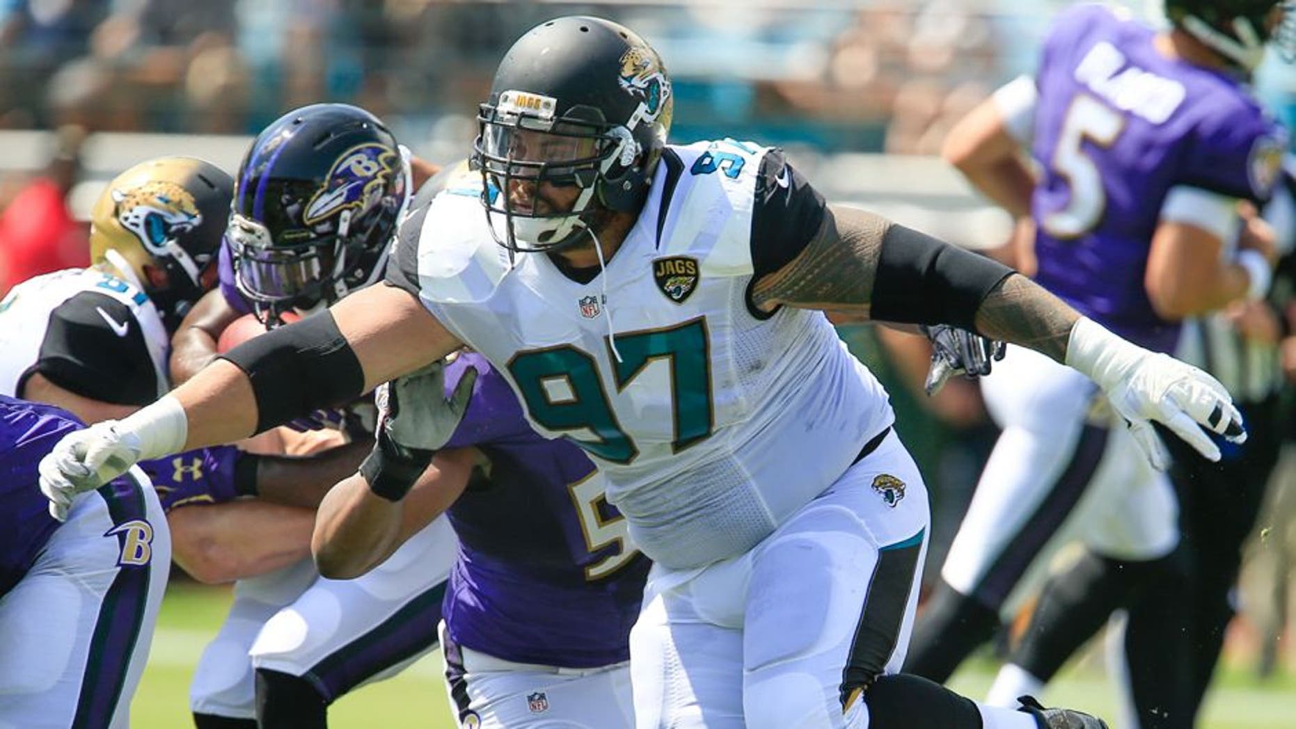 Sep 25, 2016; Jacksonville, FL, USA; Jacksonville Jaguars defensive tackle Roy Miller (97) protects the line during the first quarter of a football game against the Baltimore Ravens at EverBank Field. Mandatory Credit: Reinhold Matay-USA TODAY Sports