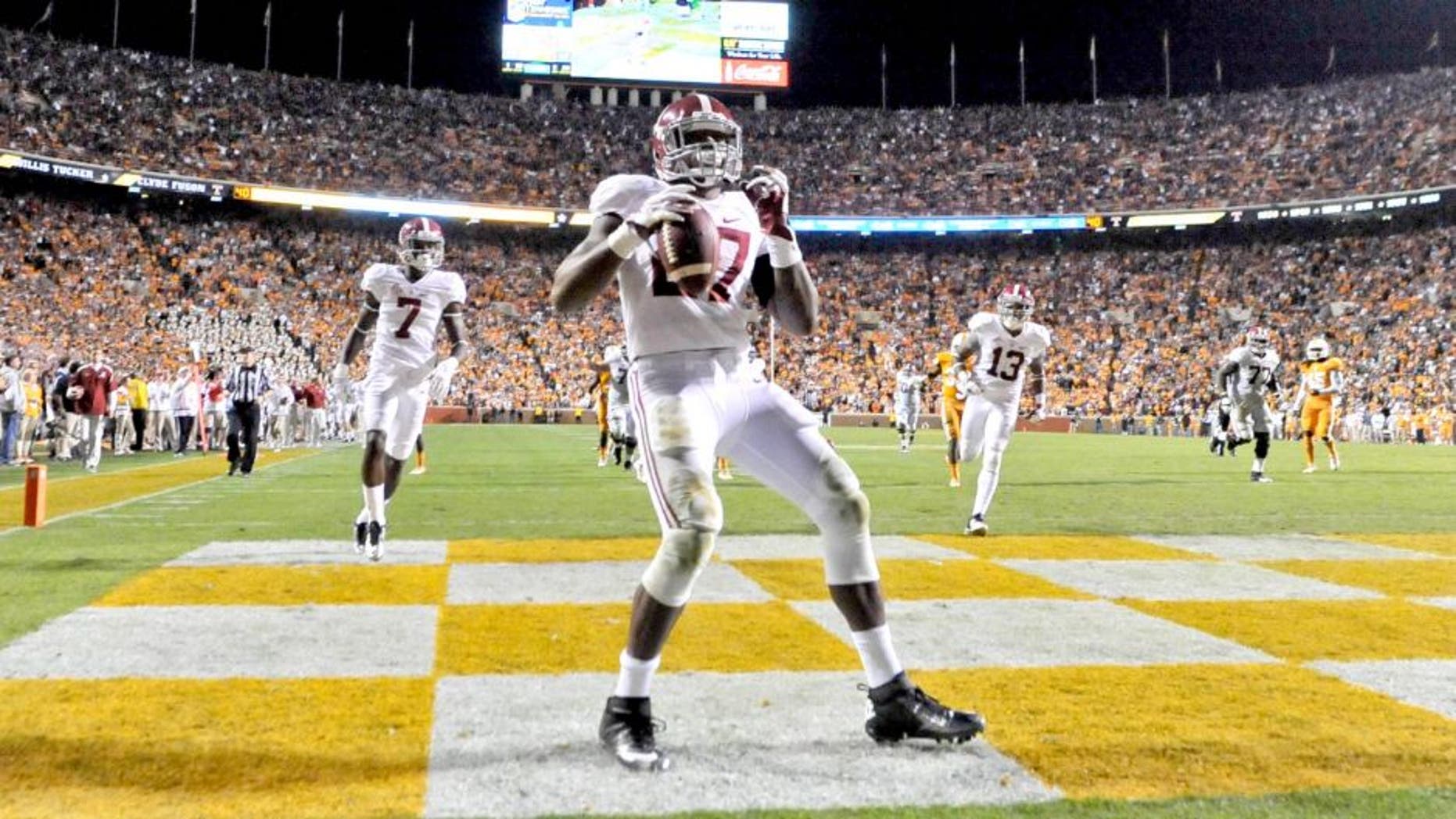Oct 25, 2014; Knoxville, TN, USA; Alabama Crimson Tide running back Derrick Henry (27) celebrates after rushing for a touchdown against the Tennessee Volunteers during the second half game at Neyland Stadium. Alabama won 34-20. Mandatory Credit: Jim Brown-USA TODAY Sports