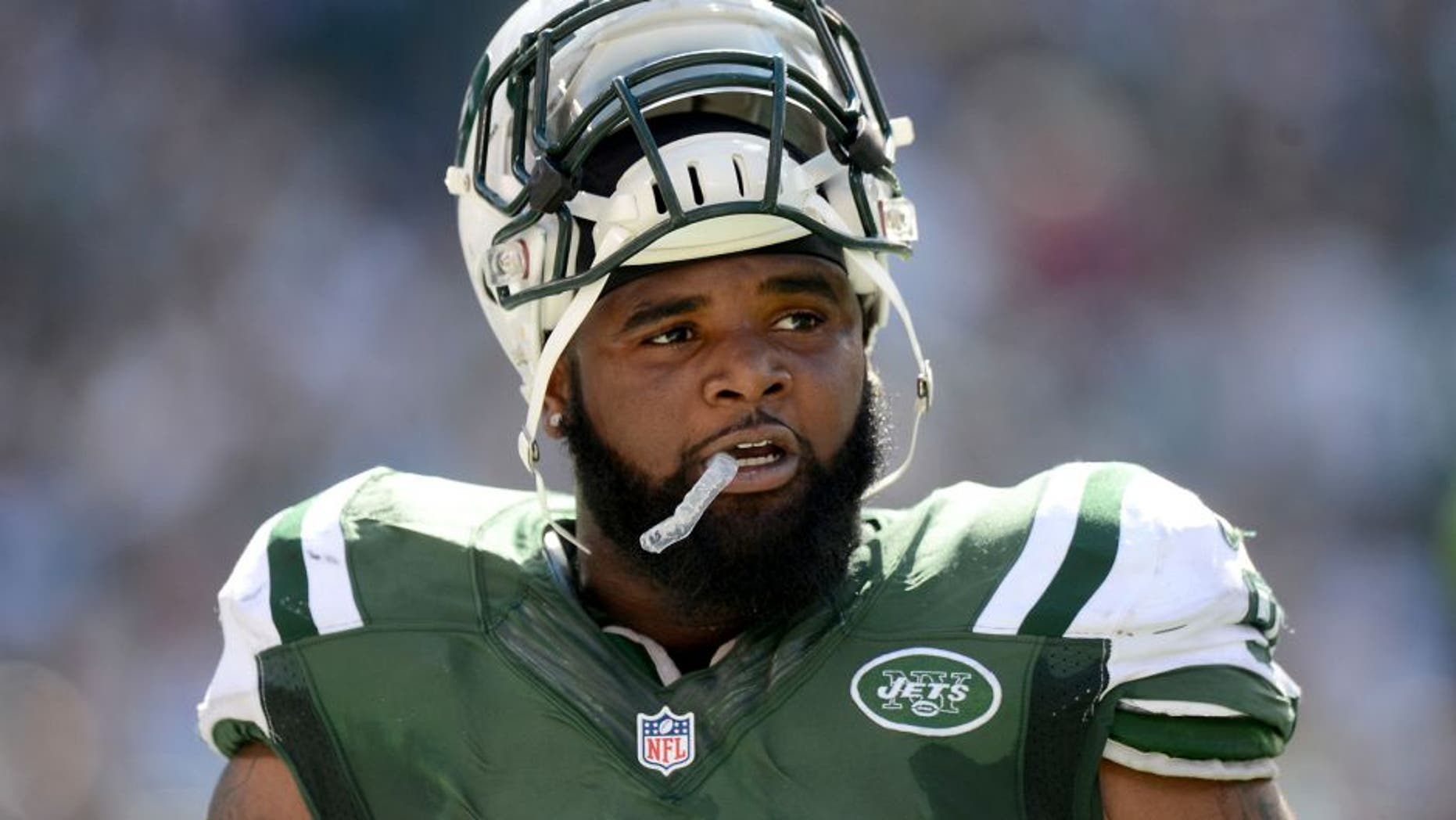 EAST RUTHERFORD, NJ - SEPTEMBER 28: Sheldon Richardson #91 of the New York Jets reacts during their 24 to 17 loss to the Detroit Lions at MetLife Stadium on September 28, 2014 in East Rutherford, New Jersey. (Photo by Ron Antonelli/Getty Images)