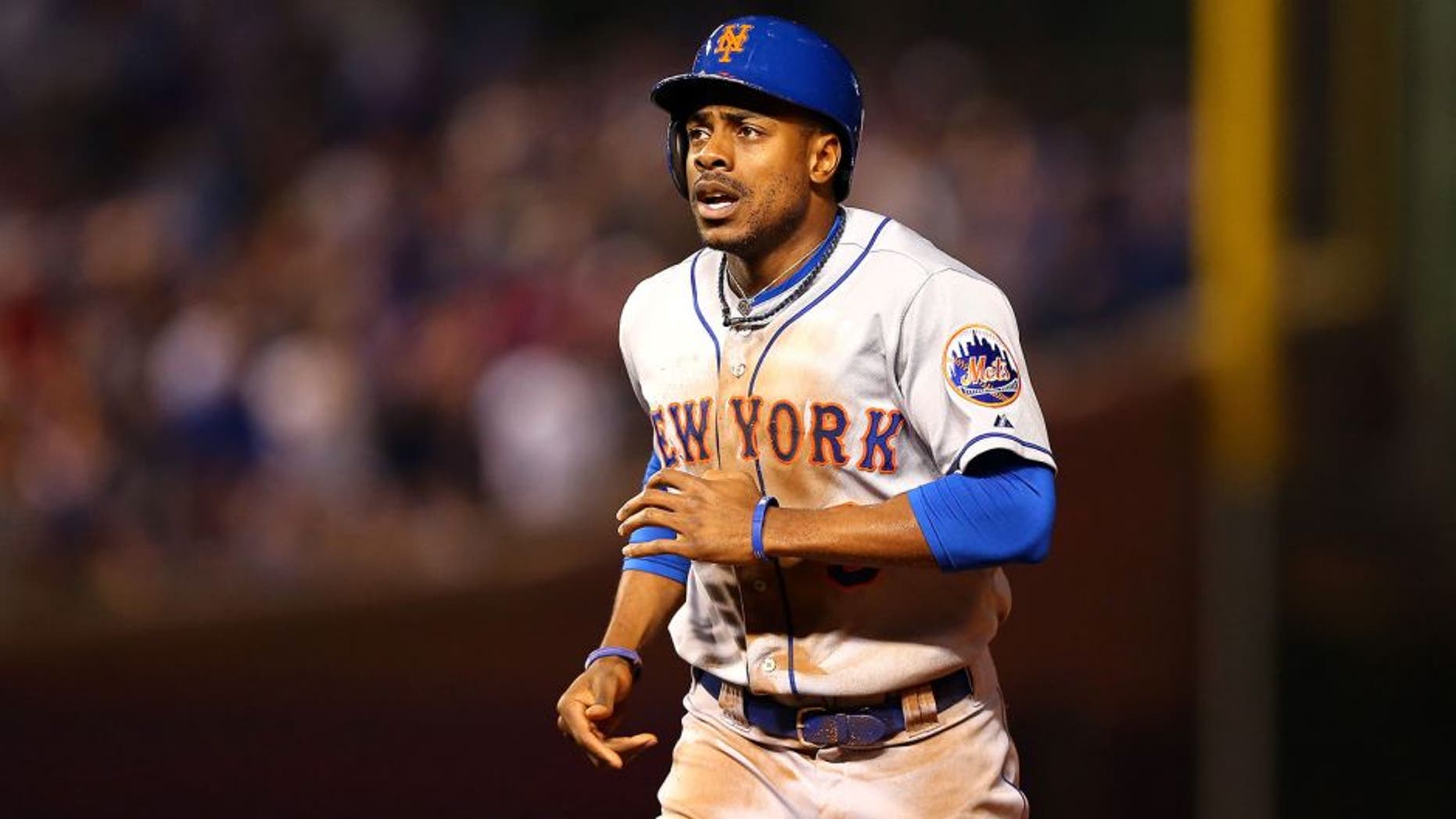 CHICAGO, IL - OCTOBER 20: Curtis Granderson #3 of the New York Mets runs back to the dugout after being tagged out at second base in the first inning against the Chicago Cubs during game three of the 2015 MLB National League Championship Series at Wrigley Field on October 20, 2015 in Chicago, Illinois. (Photo by Elsa/Getty Images)