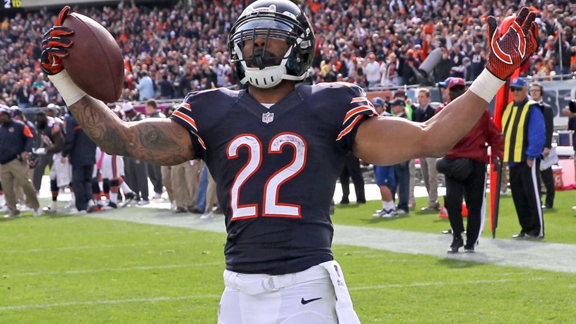 CHICAGO, IL - OCTOBER 19: Matt Forte #22 of the Chicago Bears celebrates his touchdown during the third quarter of a game against the Miami Dolphins at Soldier Field on October 19, 2014 in Chicago, Illinois. (Photo by Jonathan Daniel/Getty Images)