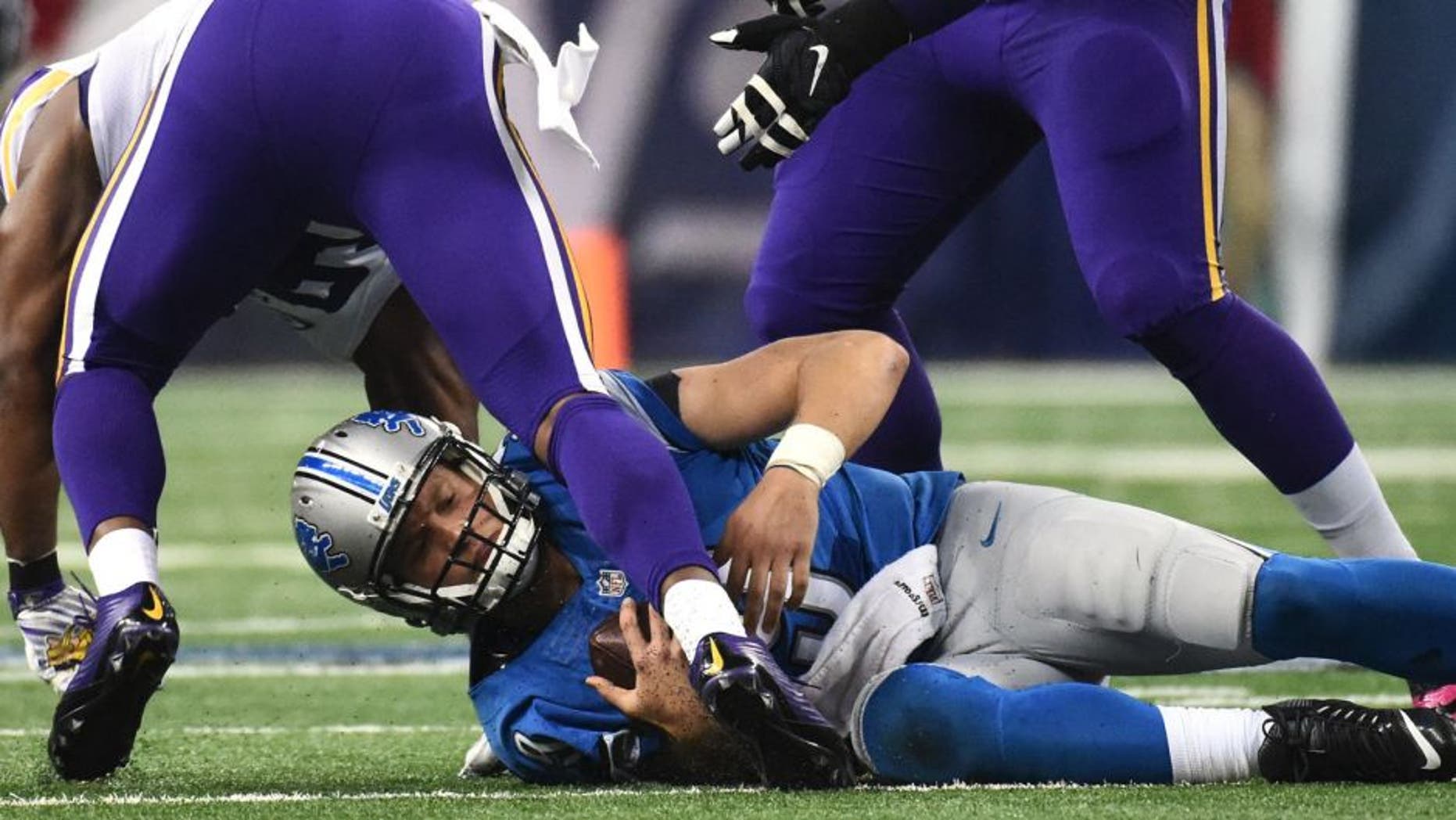 Oct 25, 2015; Detroit, MI, USA; Detroit Lions quarterback Matthew Stafford (9) is sacked during the second quarter against the Minnesota Vikings at Ford Field. Mandatory Credit: Tim Fuller-USA TODAY Sports