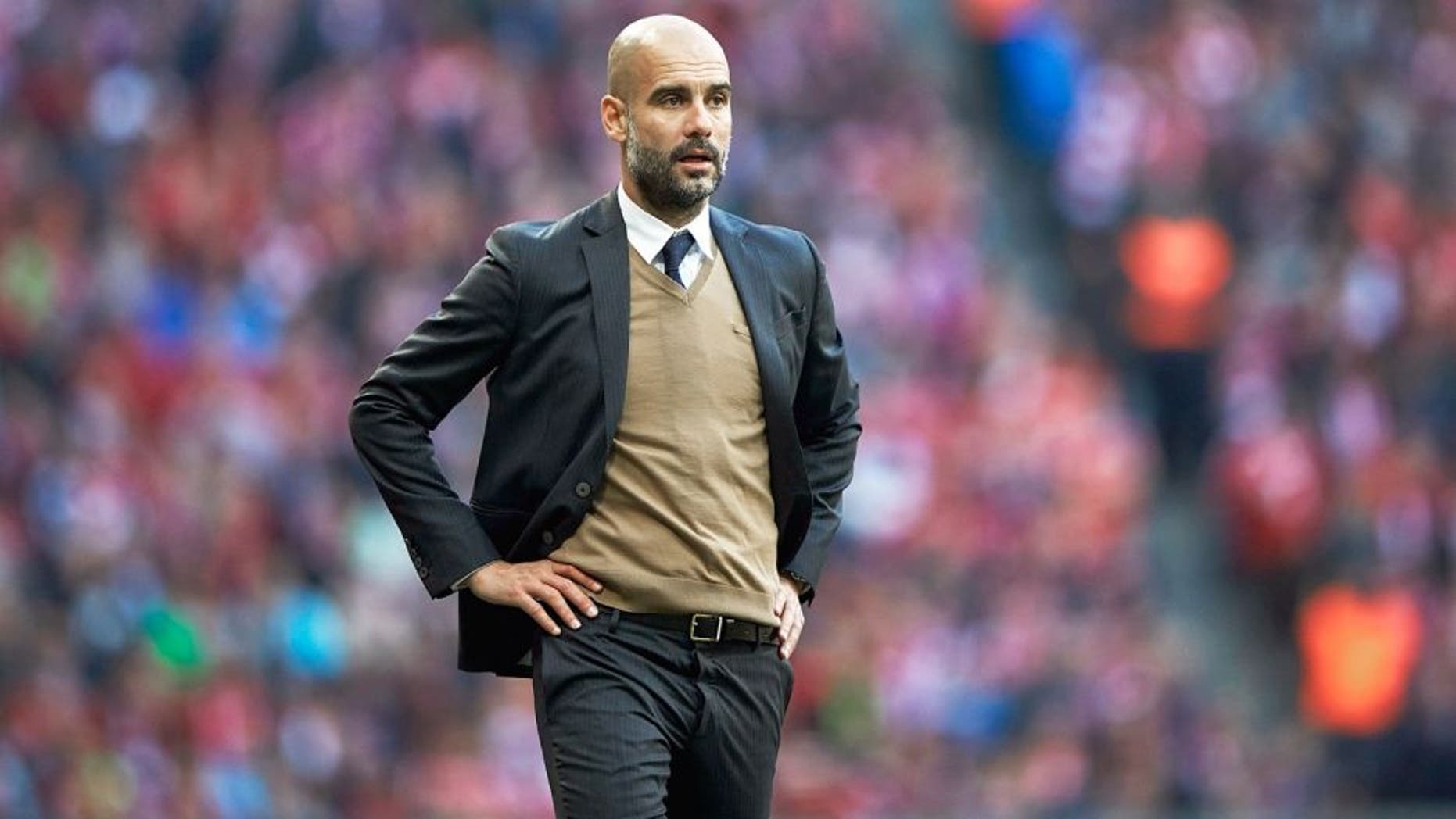 MUNICH, GERMANY - OCTOBER 24: Josep Guardiola Head Coach of FC Bayern Munich gives instructions during the Bundesliga match between FC Bayern Muenchen and 1. FC Koeln at Allianz Arena on October 24, 2015 in Munich, Germany. (Photo by A. Pretty/Getty Images for FC Bayern)