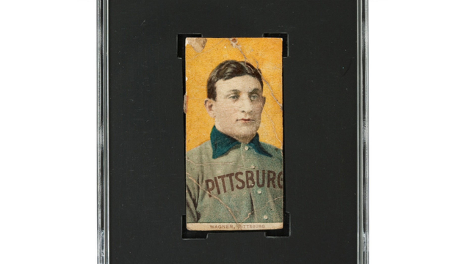 This undated photo provided by Heritage Auctions shows a rare century-old T206 Honus Wagner baseball card.