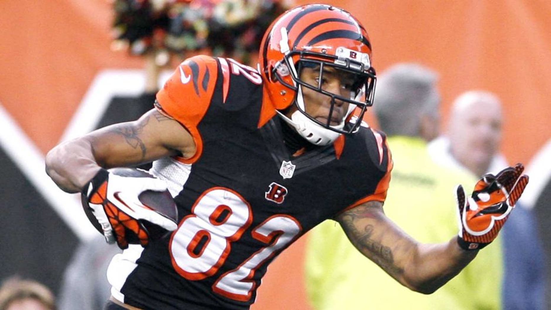 Oct 27, 2013; Cincinnati, OH, USA; Cincinnati Bengals wide receiver Marvin Jones (82) runs the ball against the New York Jets at Paul Brown Stadium. Cincinnati defeated New York 49-9. Mandatory Credit: Mark Zerof-USA TODAY Sports