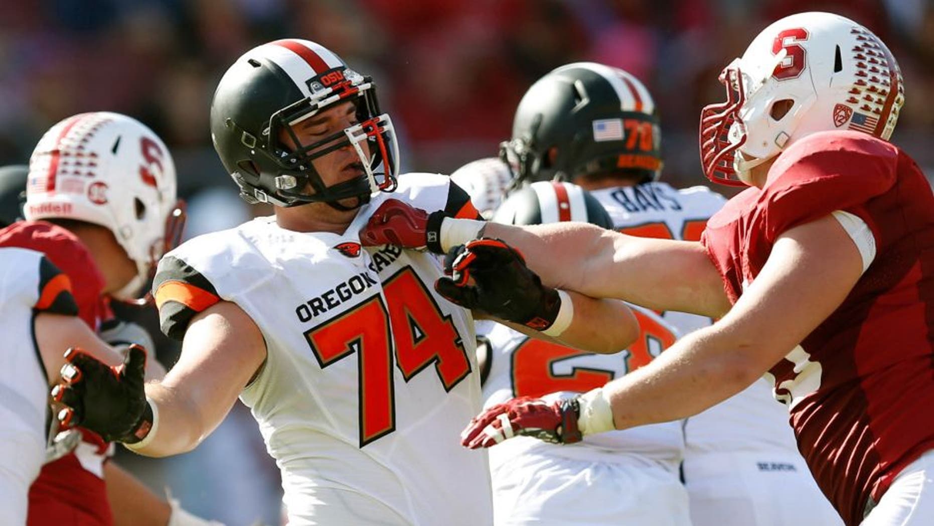 Oct 25, 2014; Stanford, CA, USA; Oregon State Beavers offensive lineman Dustin Stanton (74) blocks Stanford Cardinal linebacker Kevin Anderson (48) during the second half at Stanford Stadium. Stanford won 38-14. Mandatory Credit: Bob Stanton-USA TODAY Sports