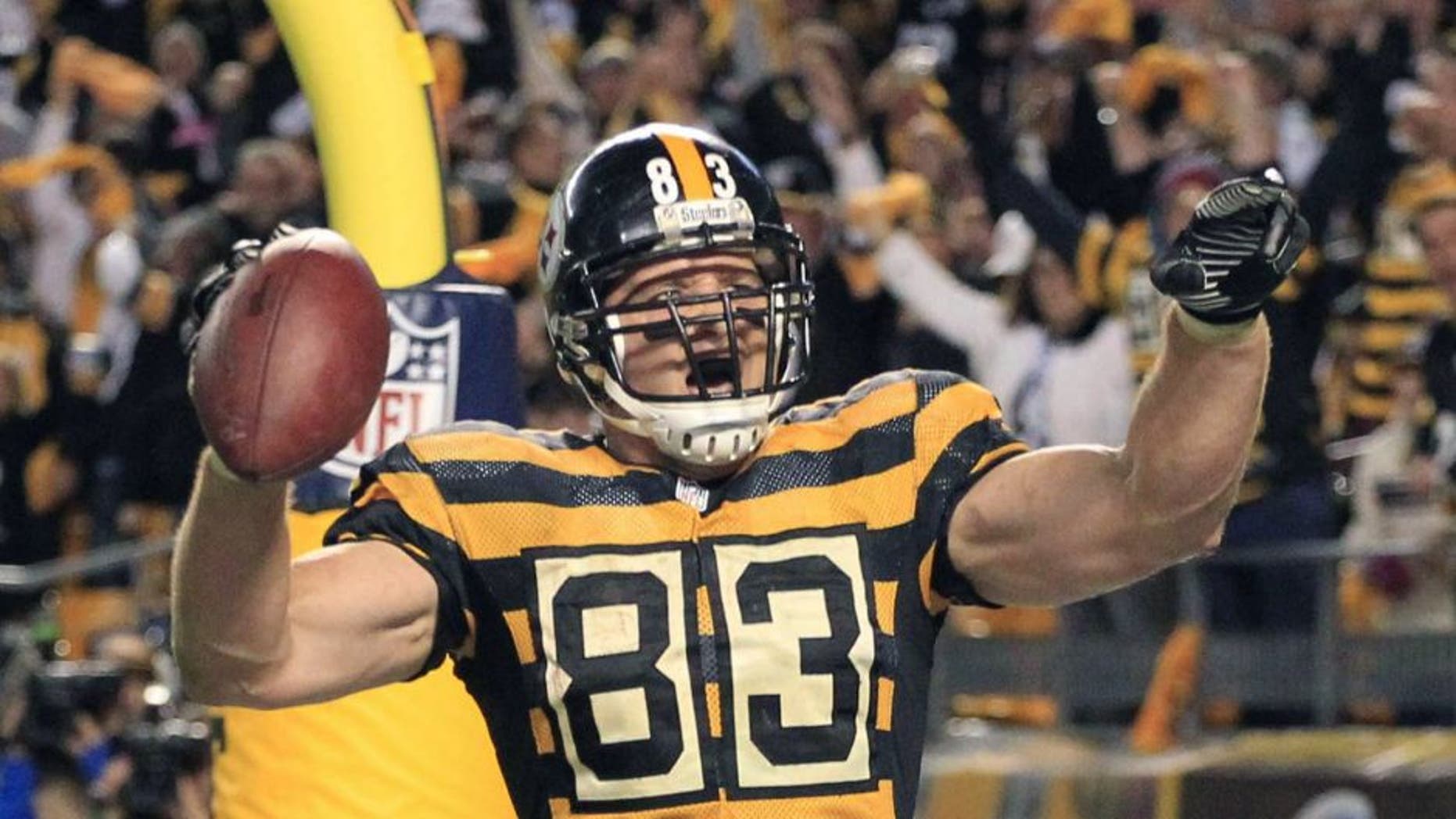 Oct 26, 2014; Pittsburgh, PA, USA; Pittsburgh Steelers tight end Heath Miller (83) celebrates after catching an eleven yard touchdown pass against the Indianapolis Colts during the fourth quarter at Heinz Field. The Steelers won 51-34. Mandatory Credit: Charles LeClaire-USA TODAY Sports