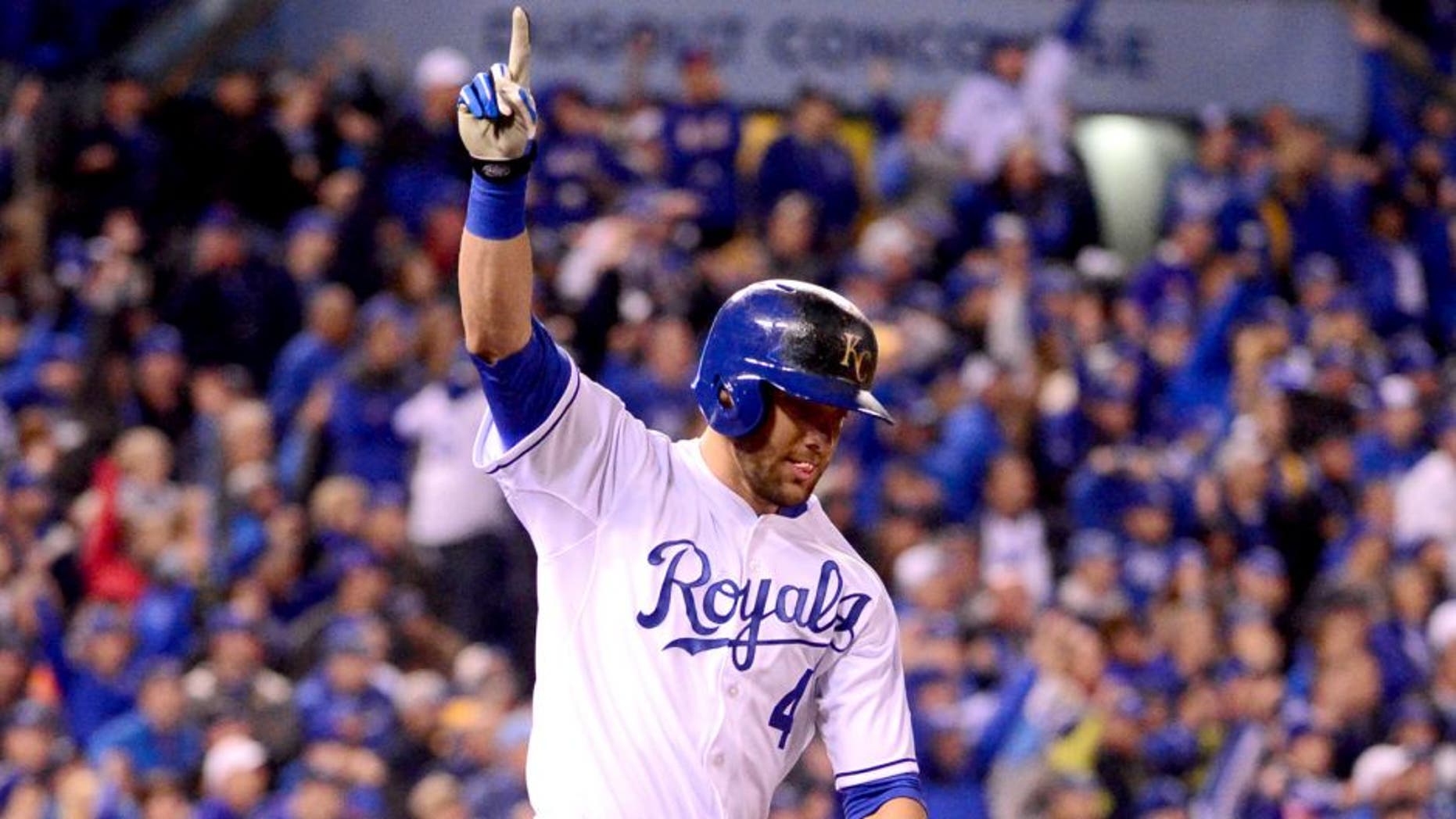 Oct 27, 2015; Kansas City, MO, USA; Kansas City Royals left fielder Alex Gordon (4) celebrates after hitting a solo home run against the New York Mets in the 9th inning in game one of the 2015 World Series at Kauffman Stadium. Mandatory Credit: Jeff Curry-USA TODAY Sports