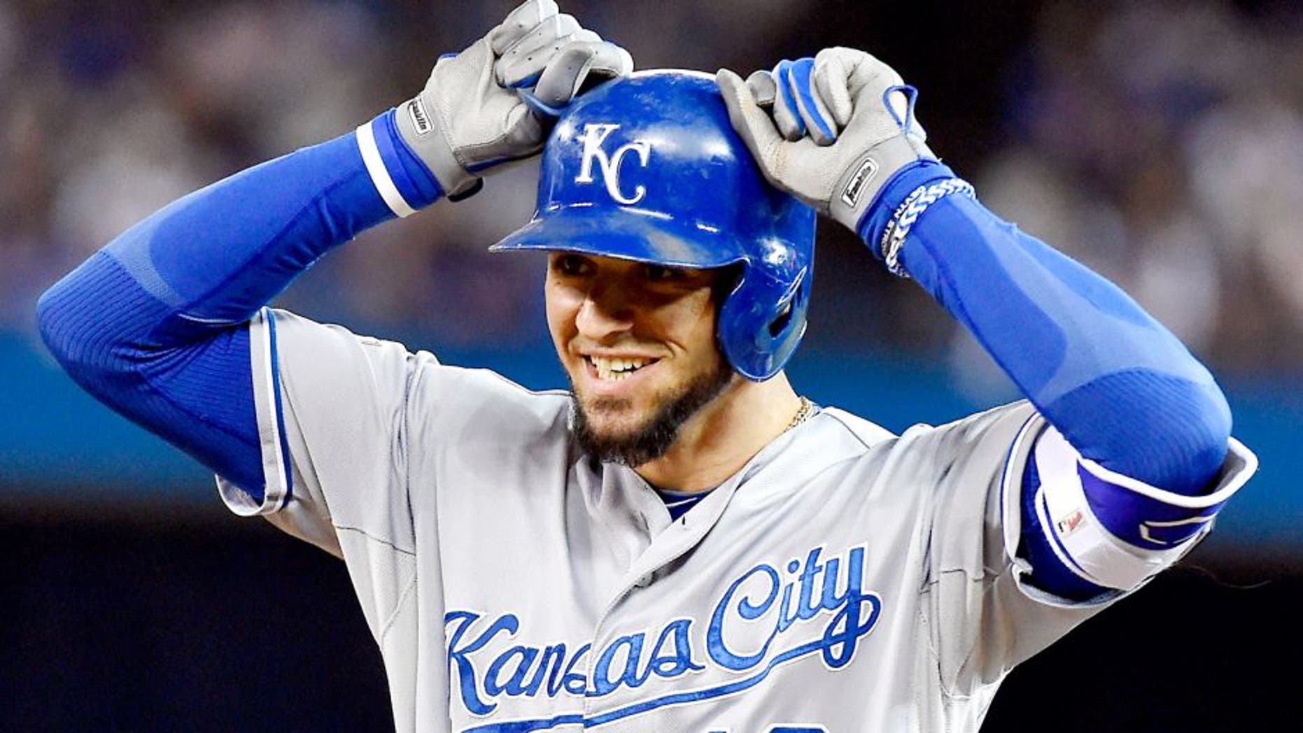 The Kansas City Royals' Paulo Orlando celebrates after hitting a single to load the bases in the eighth inning against the Toronto Blue Jays during Game 4 of the ALCS on Tuesday, Oct. 20, 2015, at Rogers Centre in Toronto. (John Sleezer/Kansas City Star/TNS via Getty Images)