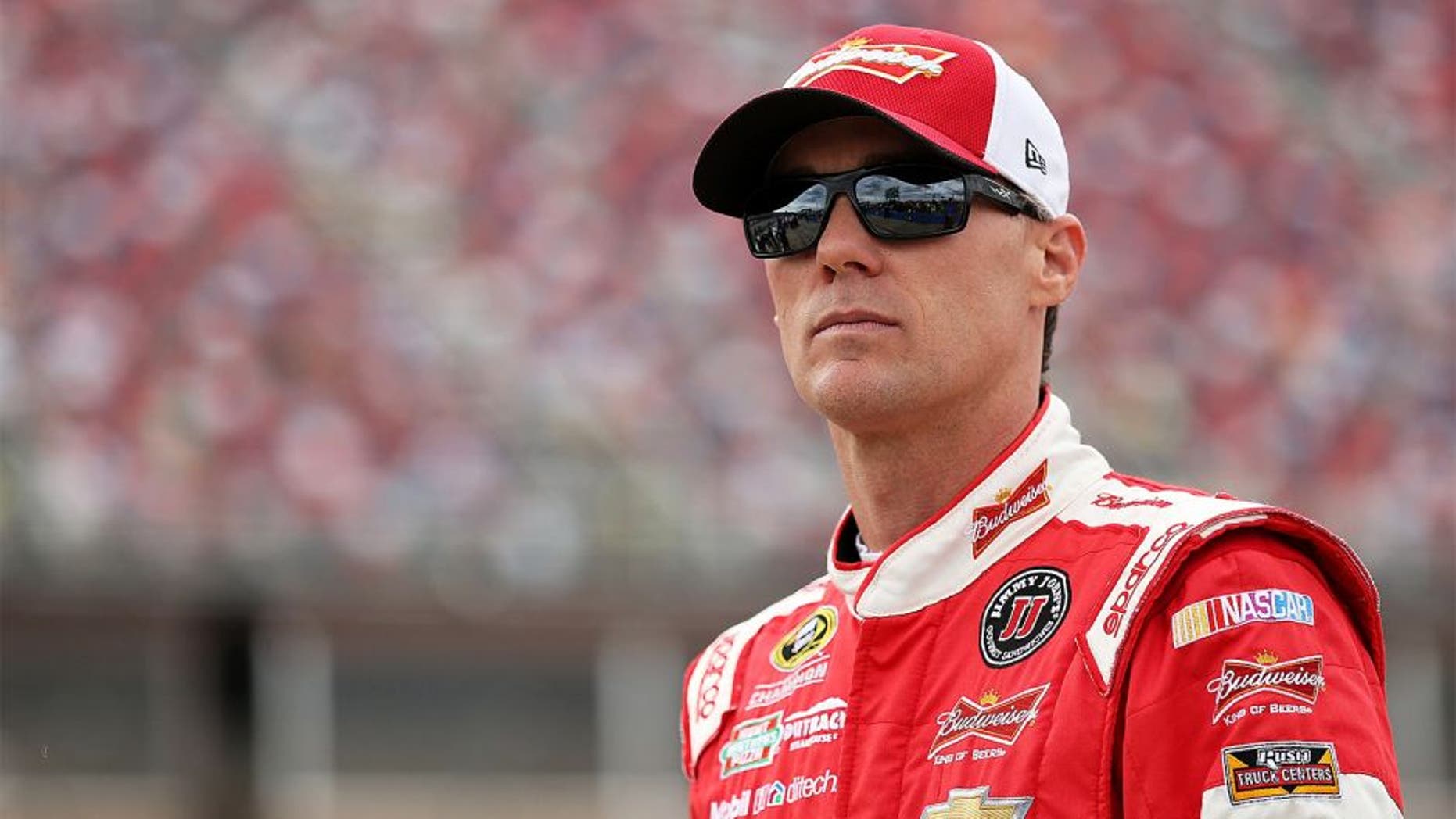 TALLADEGA, AL - OCTOBER 24: Kevin Harvick, driver of the #4 Budweiser/Jimmy John's Chevrolet, stands on the grid during qualifying for the NASCAR Sprint Cup Series CampingWorld.com 500 at Talladega Superspeedway on October 24, 2015 in Talladega, Alabama. (Photo by Patrick Smith/Getty Images)