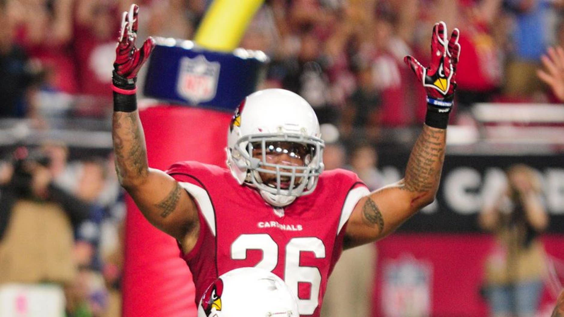 Oct 26, 2015; Glendale, AZ, USA; Arizona Cardinals strong safety Tony Jefferson (22) celebrates after making an interception as free safety Rashad Johnson (26) looks on during the second half against the Baltimore Ravens at University of Phoenix Stadium. Mandatory Credit: Matt Kartozian-USA TODAY Sports