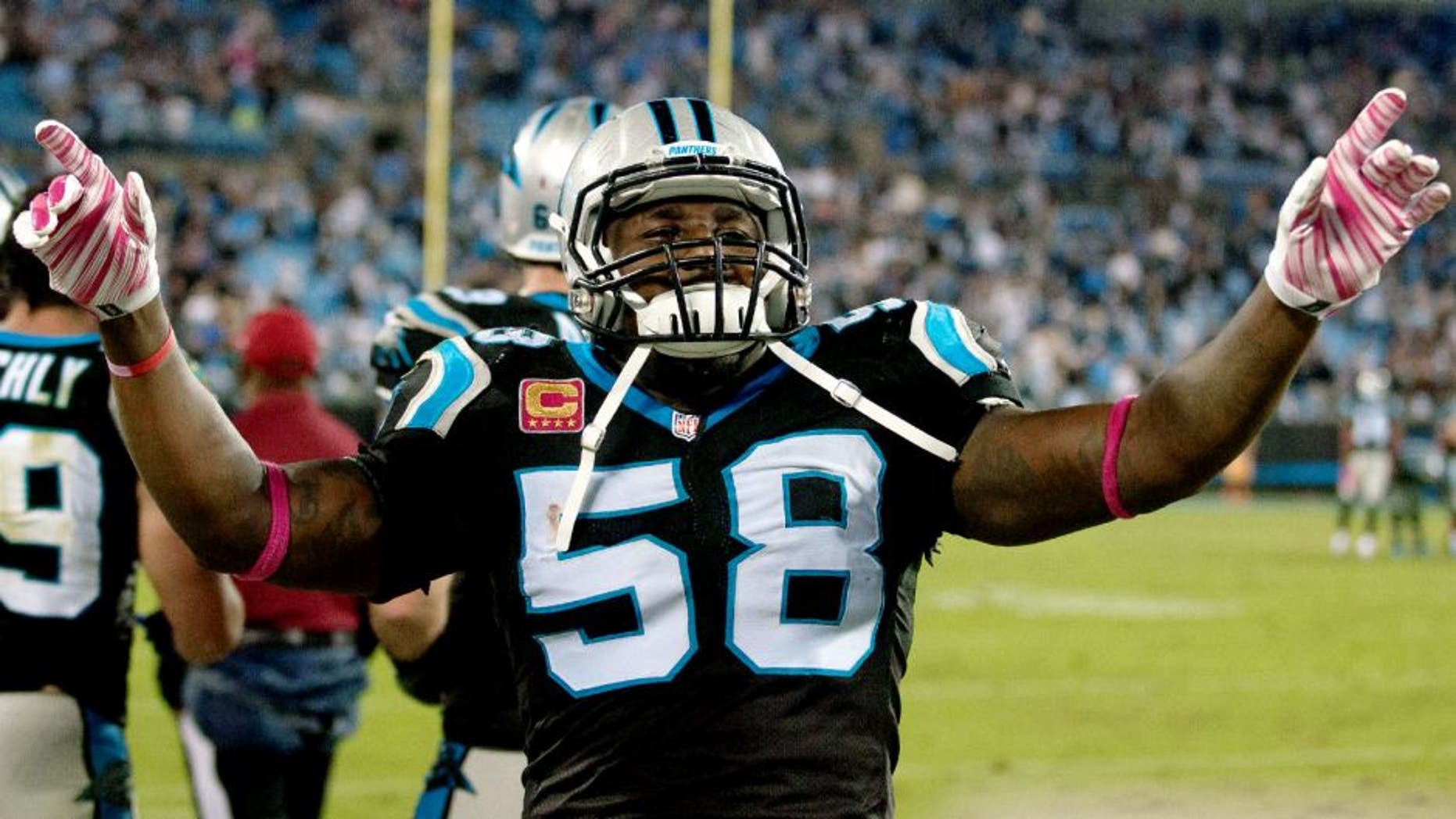 Oct 25, 2015; Charlotte, NC, USA; Carolina Panthers outside linebacker Thomas Davis (58) directs the crowd to the song Sweet Caroline during the final second of the game against the Philadelphia Eagles at Bank of America Stadium. Carolina defeated Philadelphia 27-16. Mandatory Credit: Jeremy Brevard-USA TODAY Sports