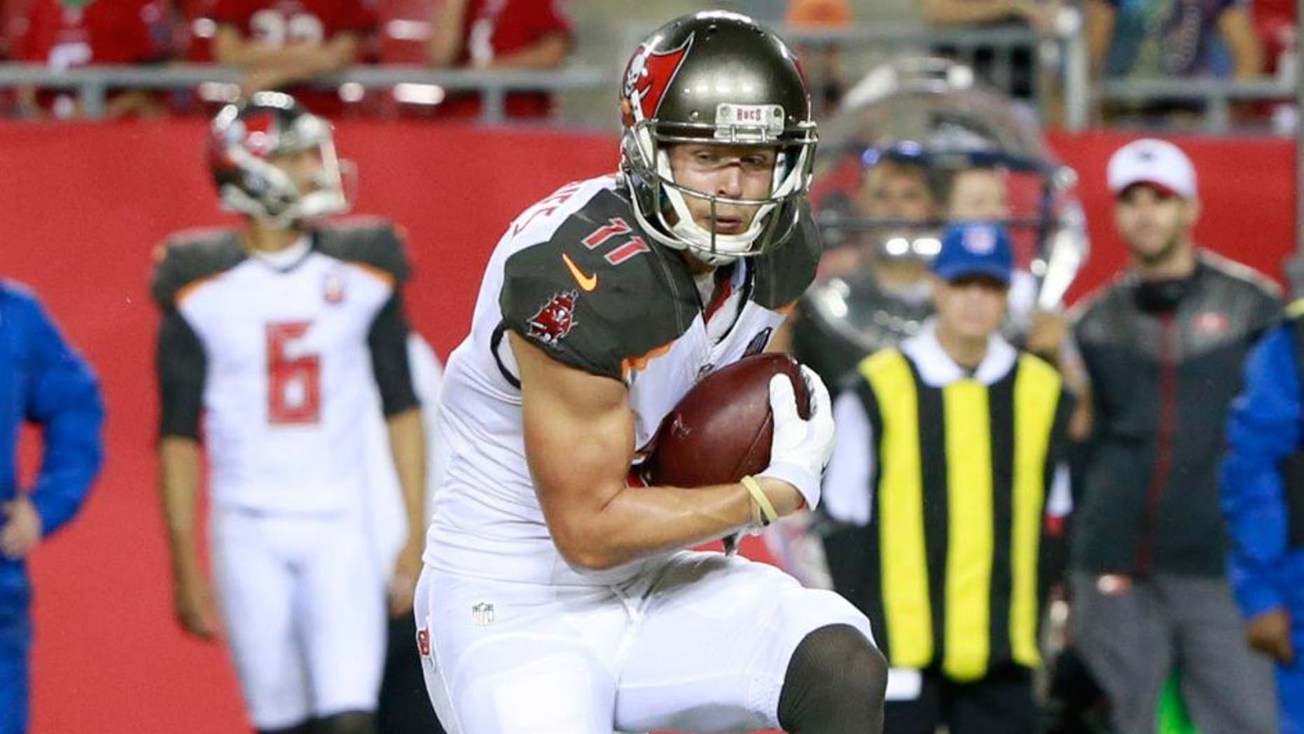 Aug 29, 2015; Tampa, FL, USA; Tampa Bay Buccaneers wide receiver Adam Humphries (11) runs with the ball against the Cleveland Browns during the second half at Raymond James Stadium. Cleveland Browns defeated the Tampa Bay Buccaneers 31-7. Mandatory Credit: Kim Klement-USA TODAY Sports