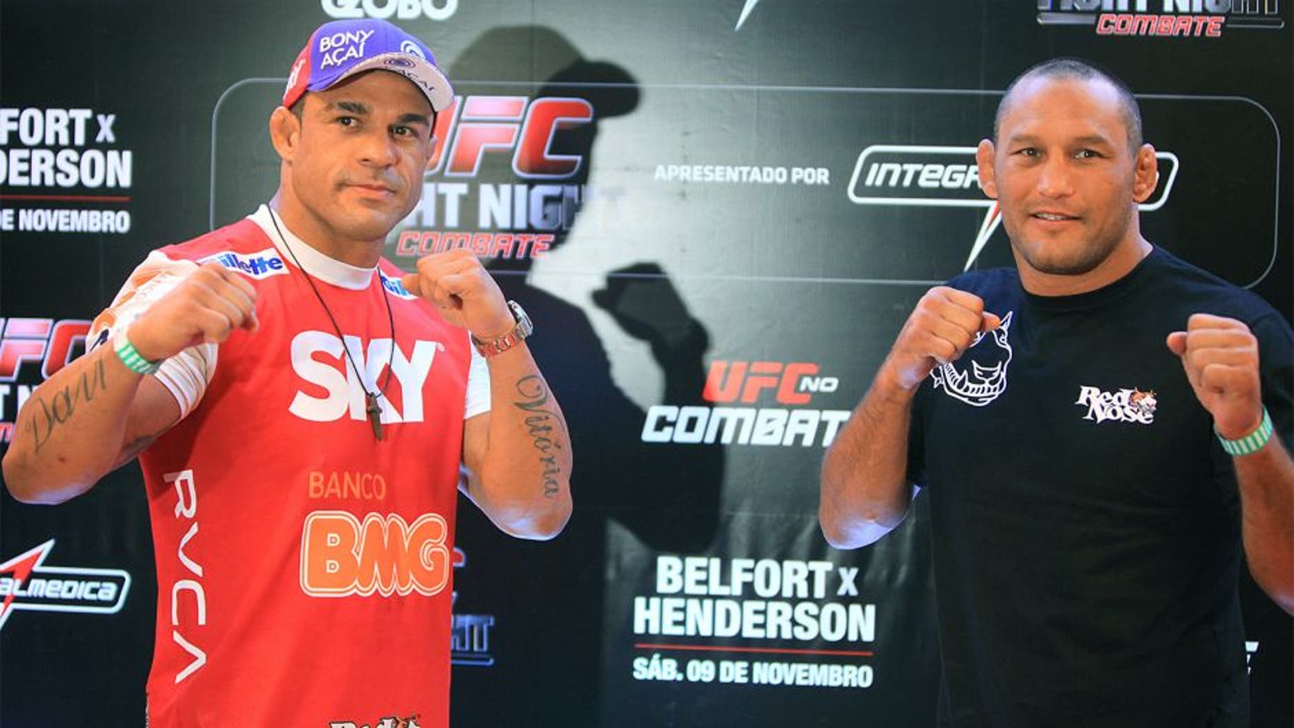 GOIANIA, BRAZIL - NOVEMBER 7: (L-R) Opponents Vitor Belfort and Dan Henderson face off during UFC Fight Night open workout at Buena Vista Shopping on November 7, 2013 in Goiania, Brazil. (Photo by Weimer Carvalho/Zuffa LLC/Zuffa LLC via Getty Images)