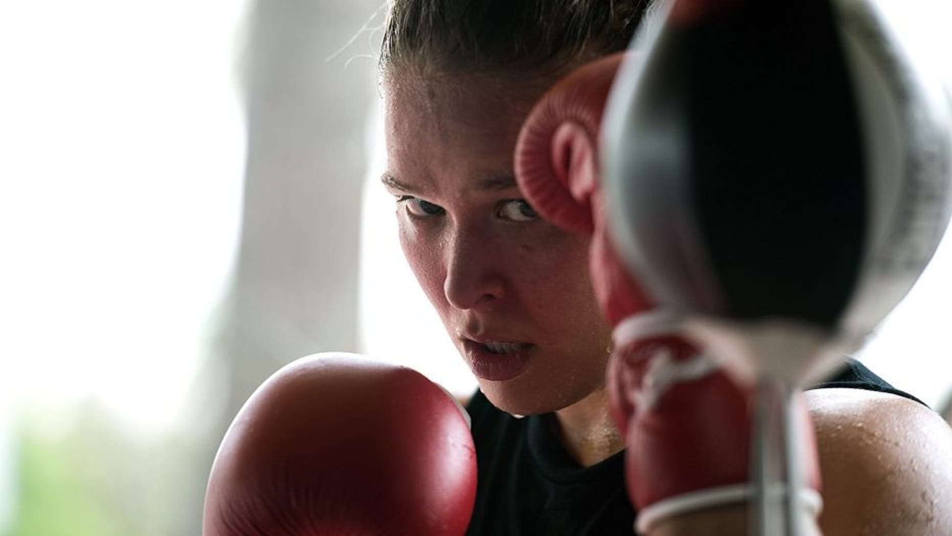 GLENDALE, CA - OCTOBER 27: UFC Bantamweight champion Ronda Rousey cools down after a workout during a media training session at the Glendale Fight Club on October 27, 2015 in Glendale, California. (Photo by Brandon Magnus/Zuffa LLC/Zuffa LLC via Getty Images)